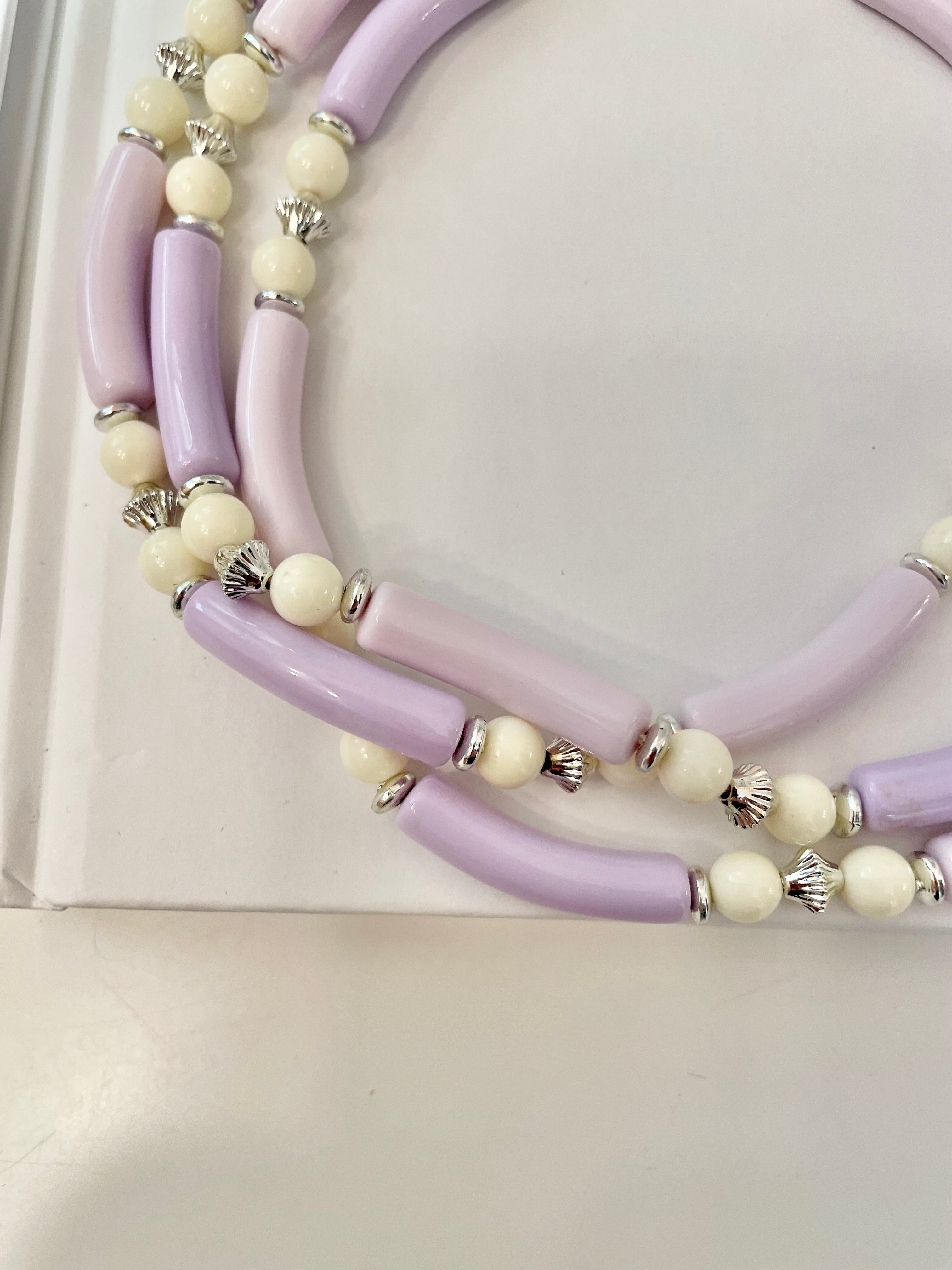 This 1960's soft purple multi strand delightful necklace is so feminine, and so chic... love this color story.