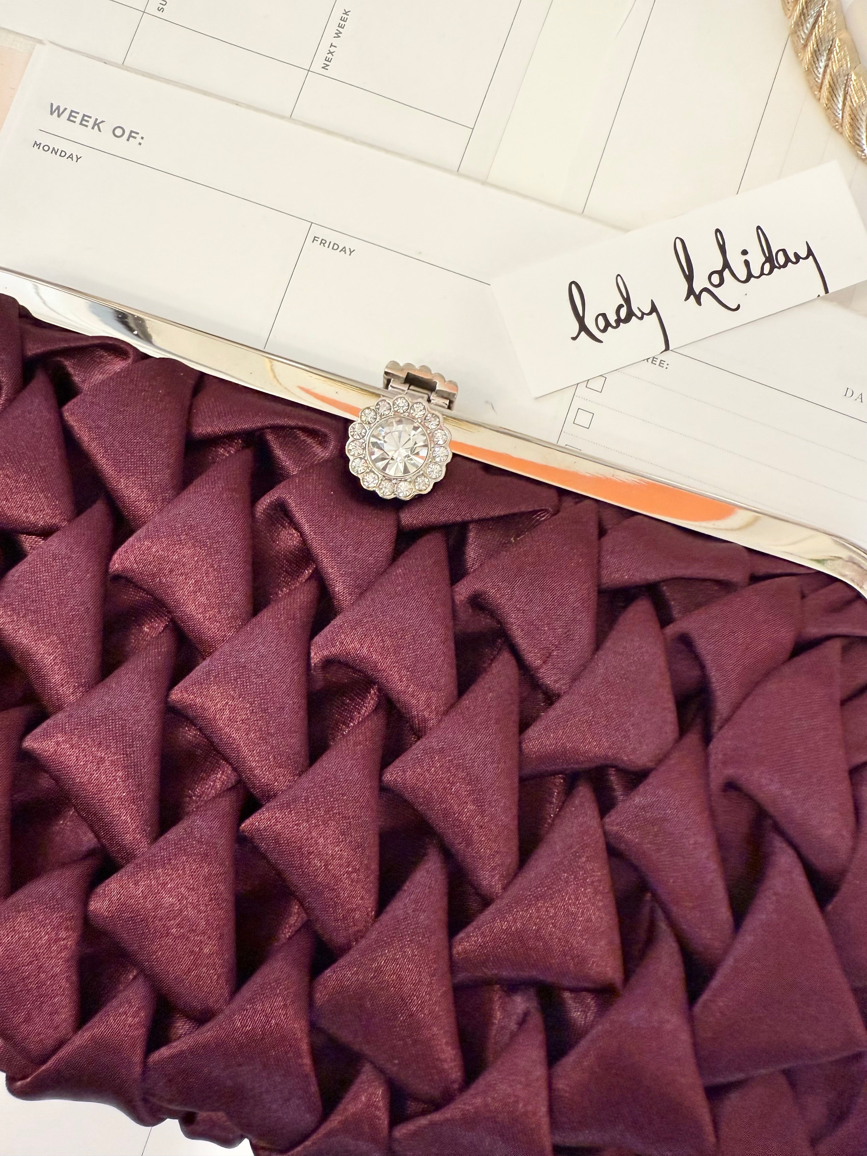 The most divine satin evening bag with extraordinary glass clasp...