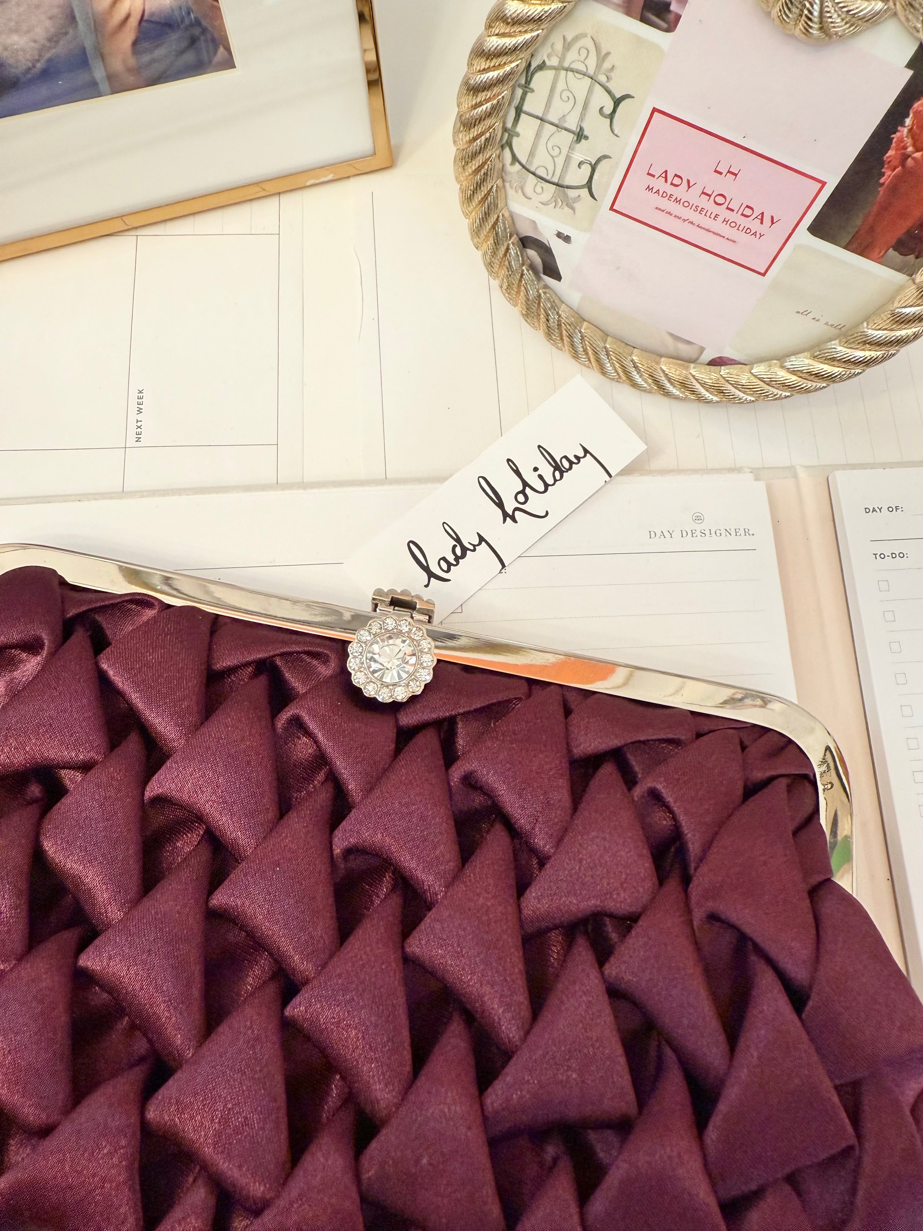 The most divine satin evening bag with extraordinary glass clasp...