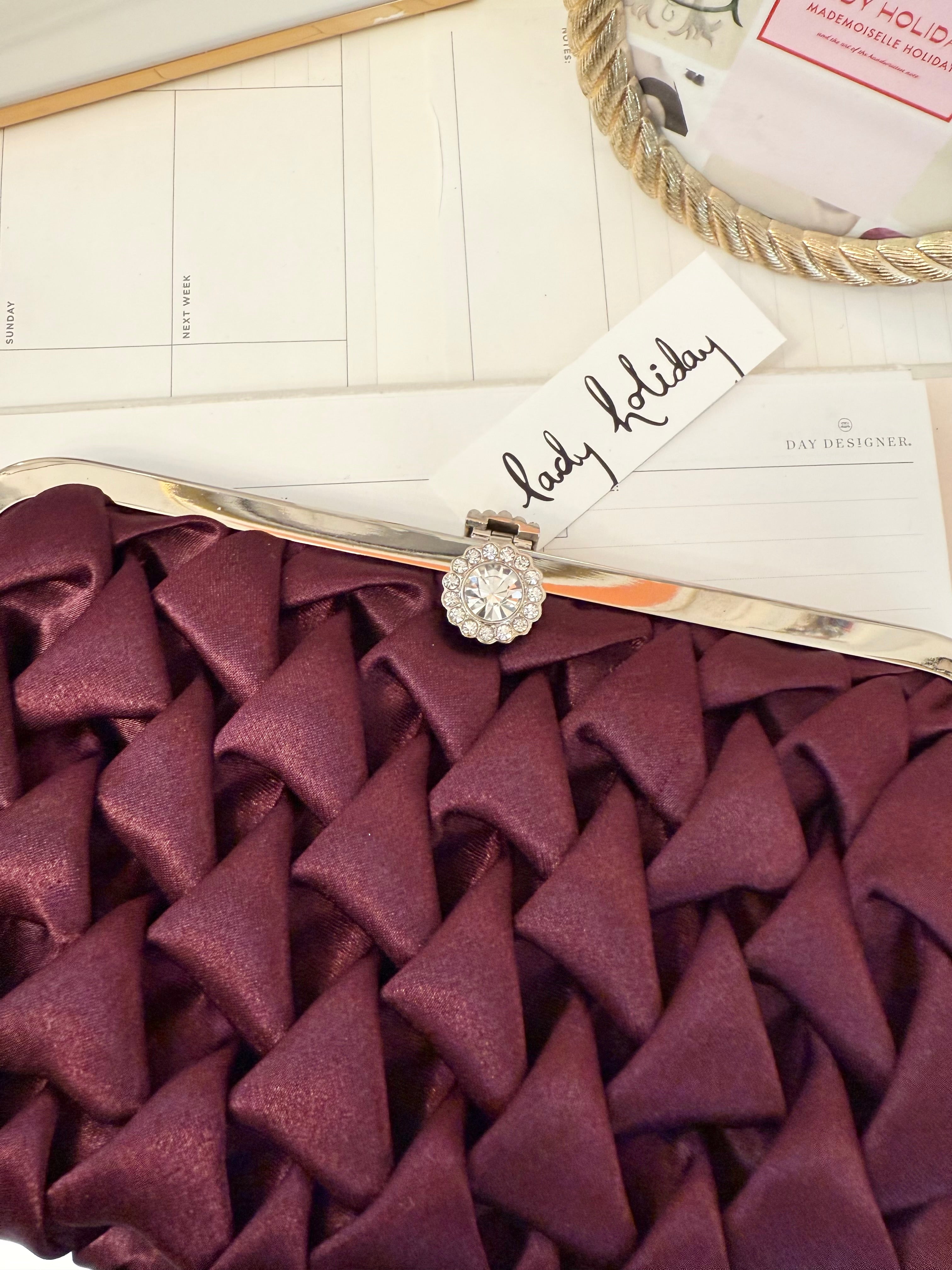 The most divine satin evening bag with extraordinary glass clasp...