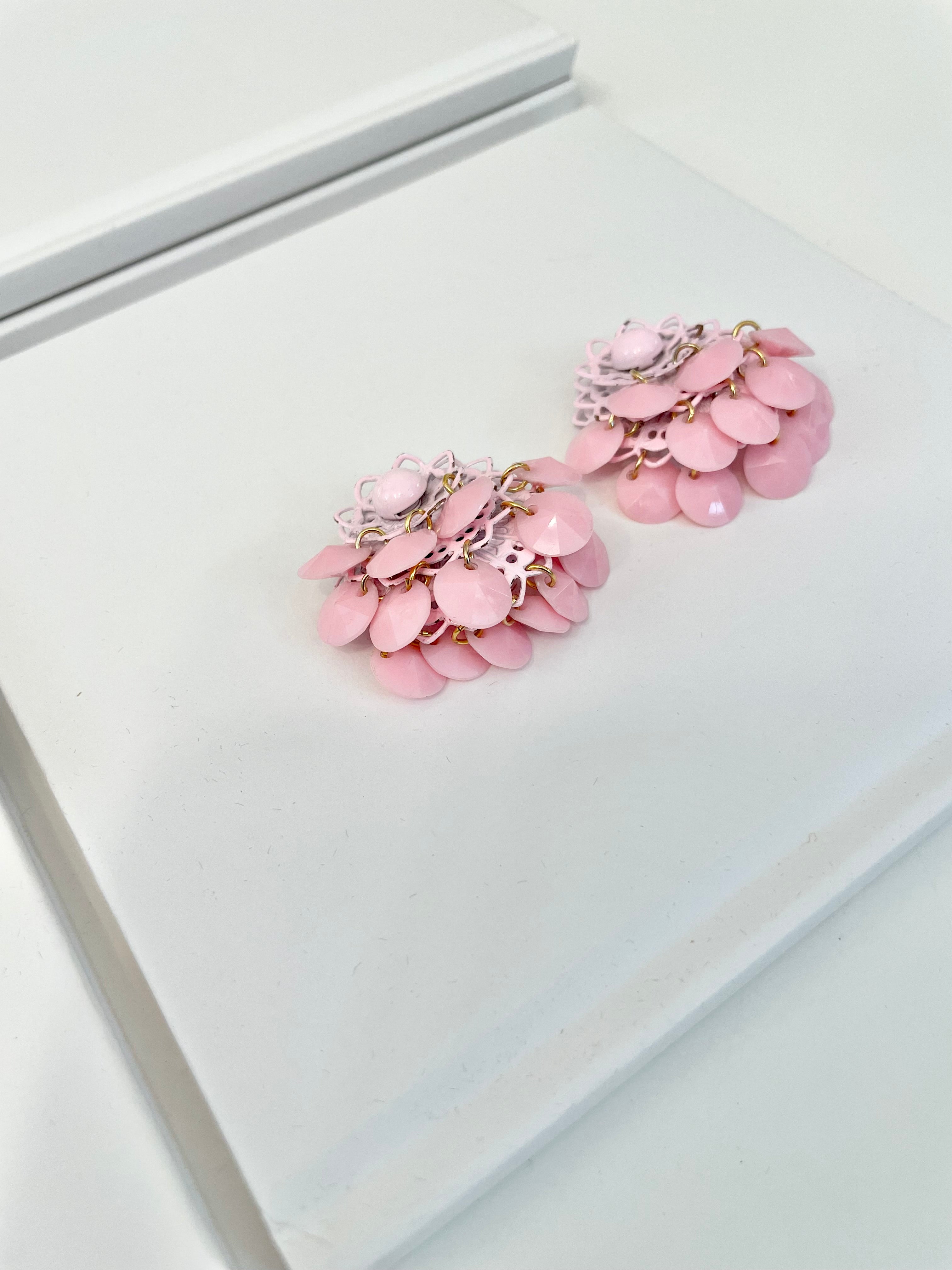 The Flirty gal and her pretty pink earrings! These are so feminine!