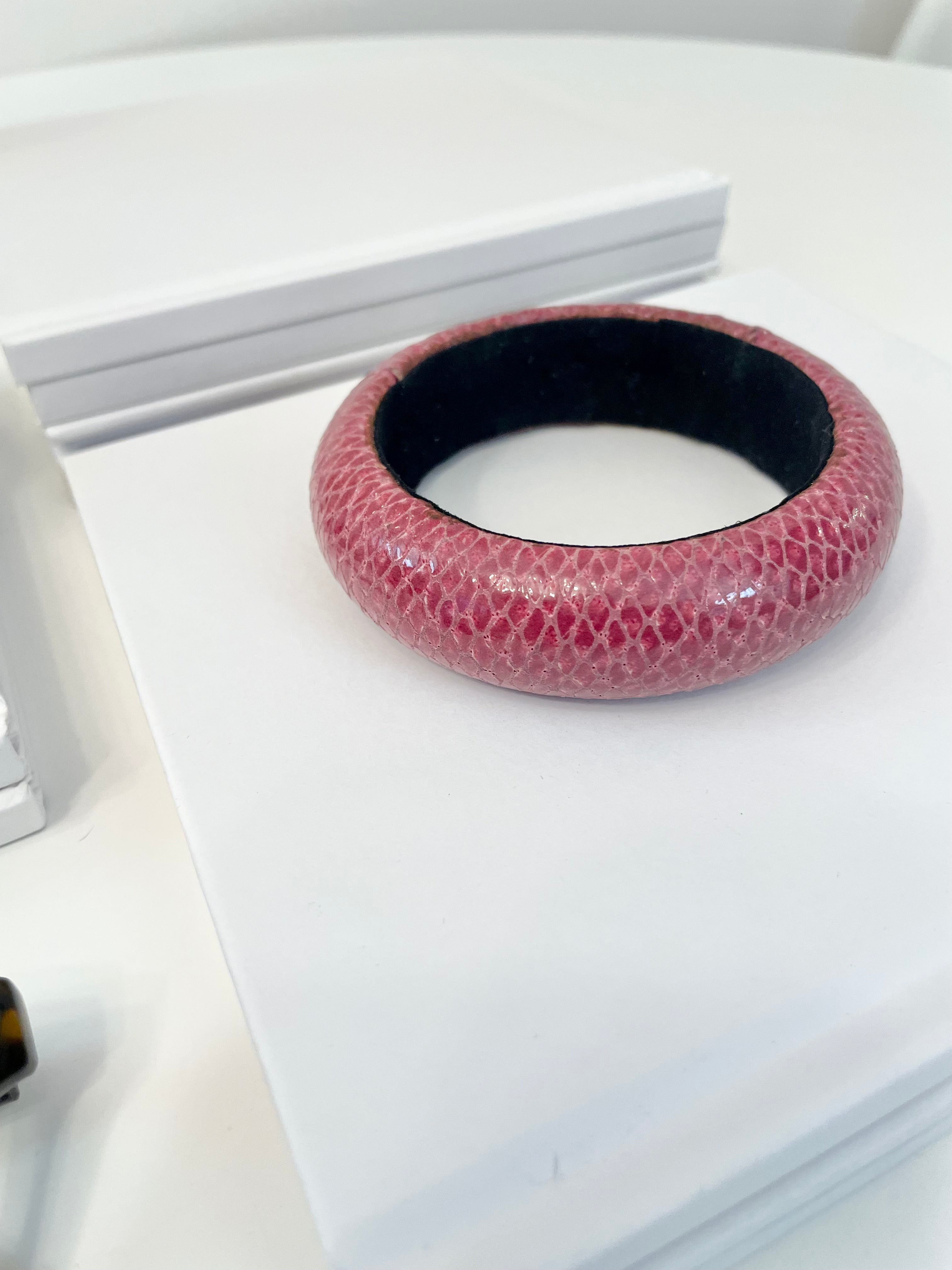 This is such a lovely 1980's faux lizard leather bangle... a truly classy piece.