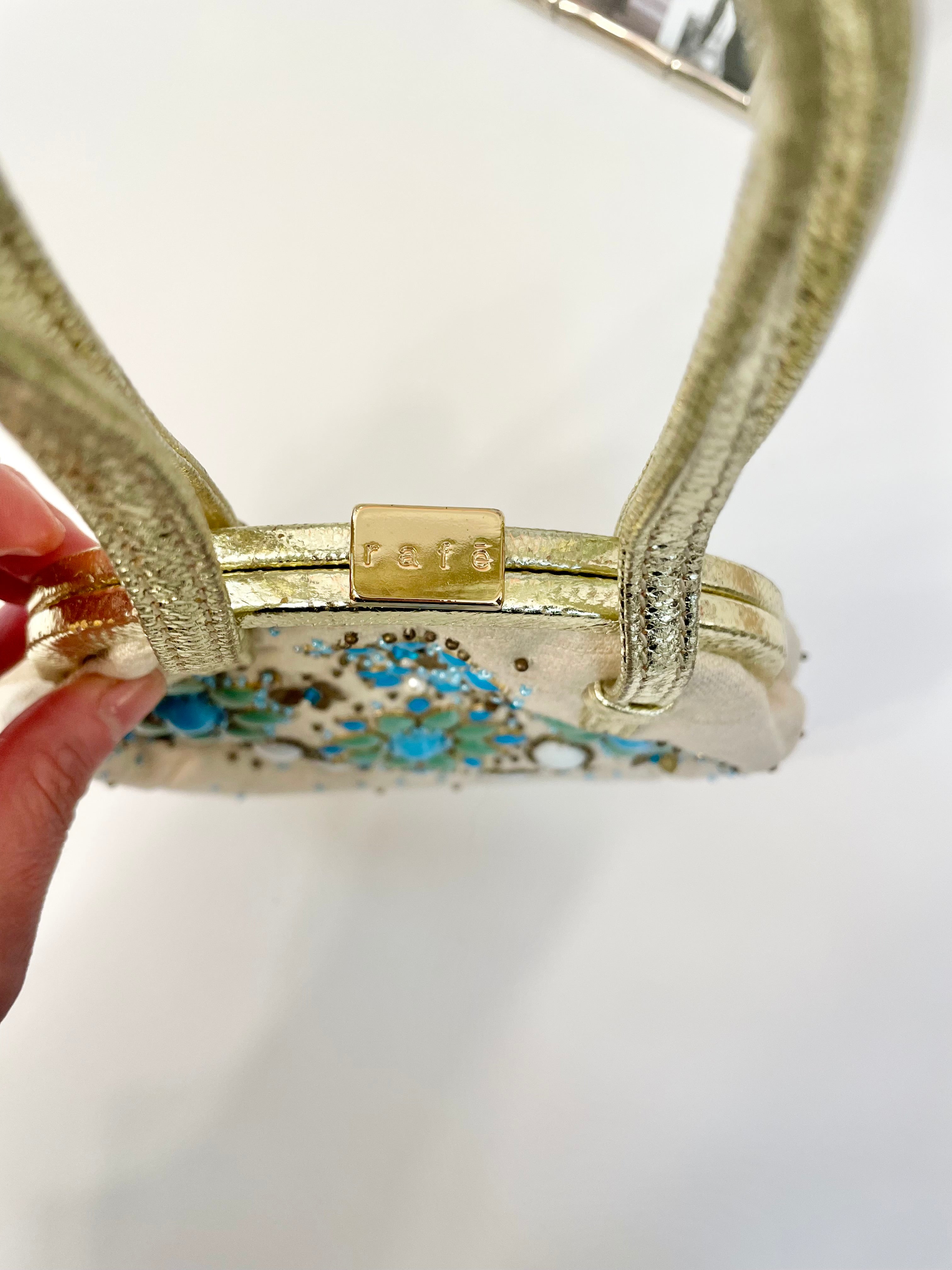 The most divine Rafe colorful beaded bag trimmed in gold leather... so feminine