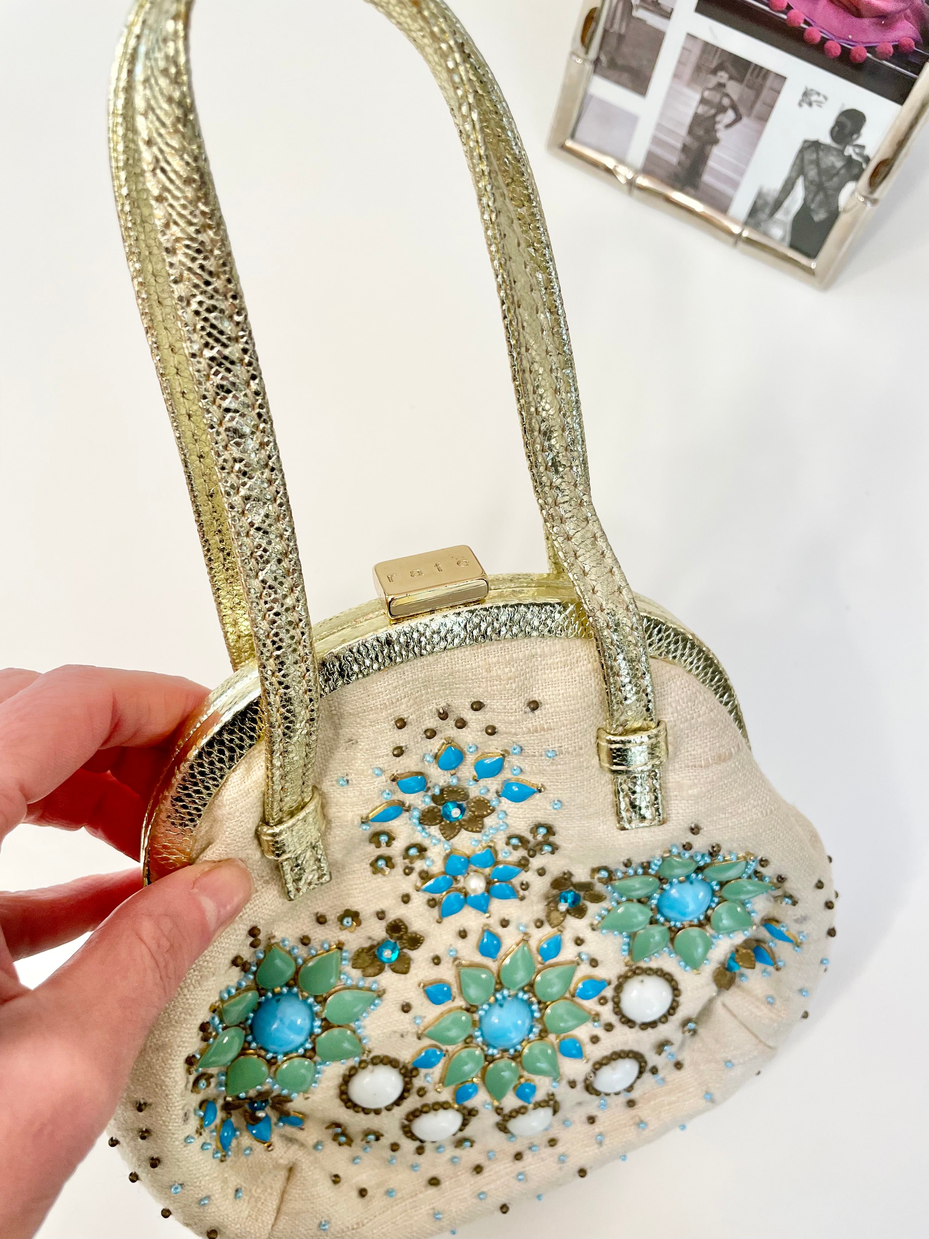 The most divine Rafe colorful beaded bag trimmed in gold leather... so feminine