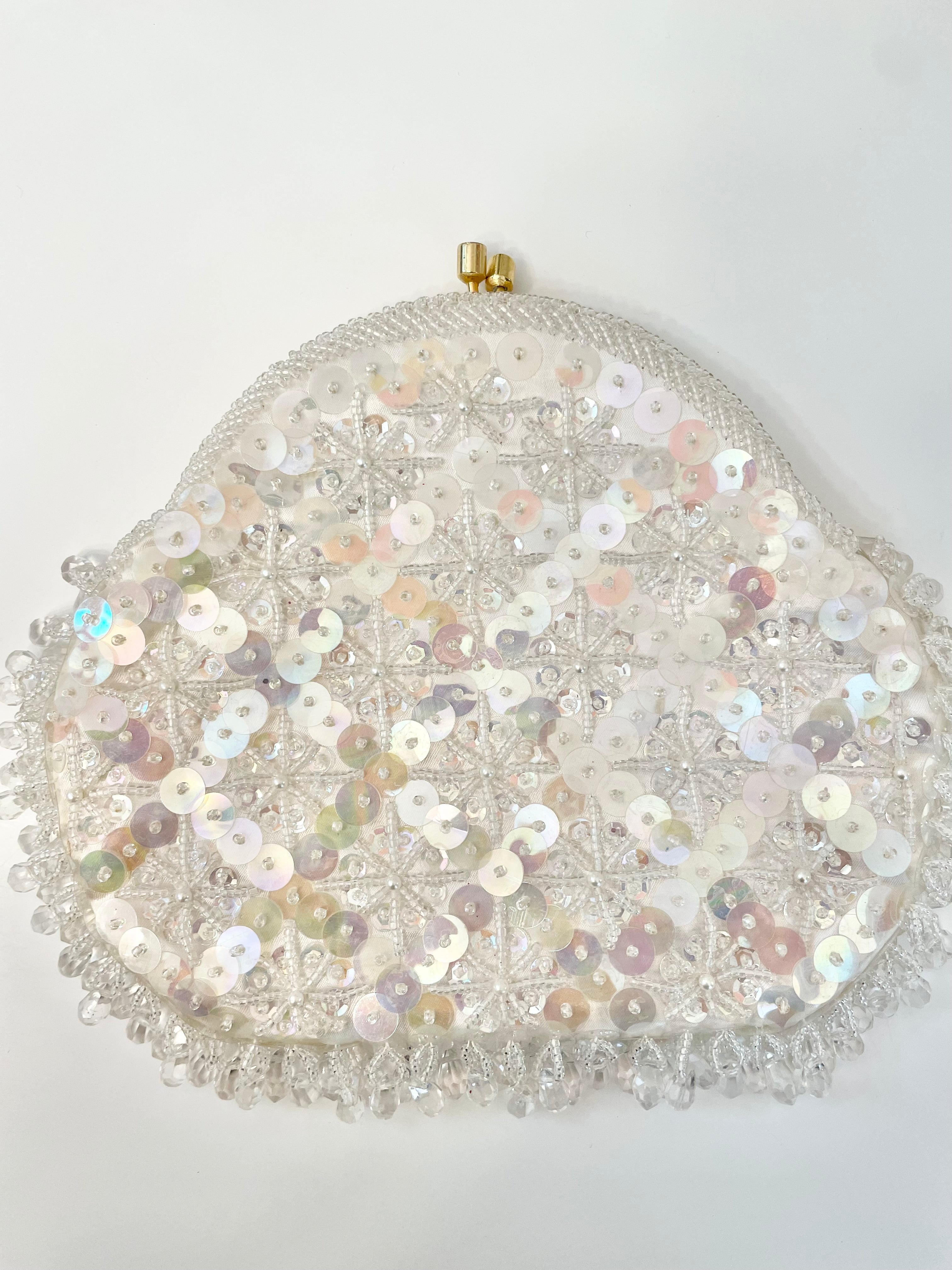 1960's charming ivory satin cha cha bag....