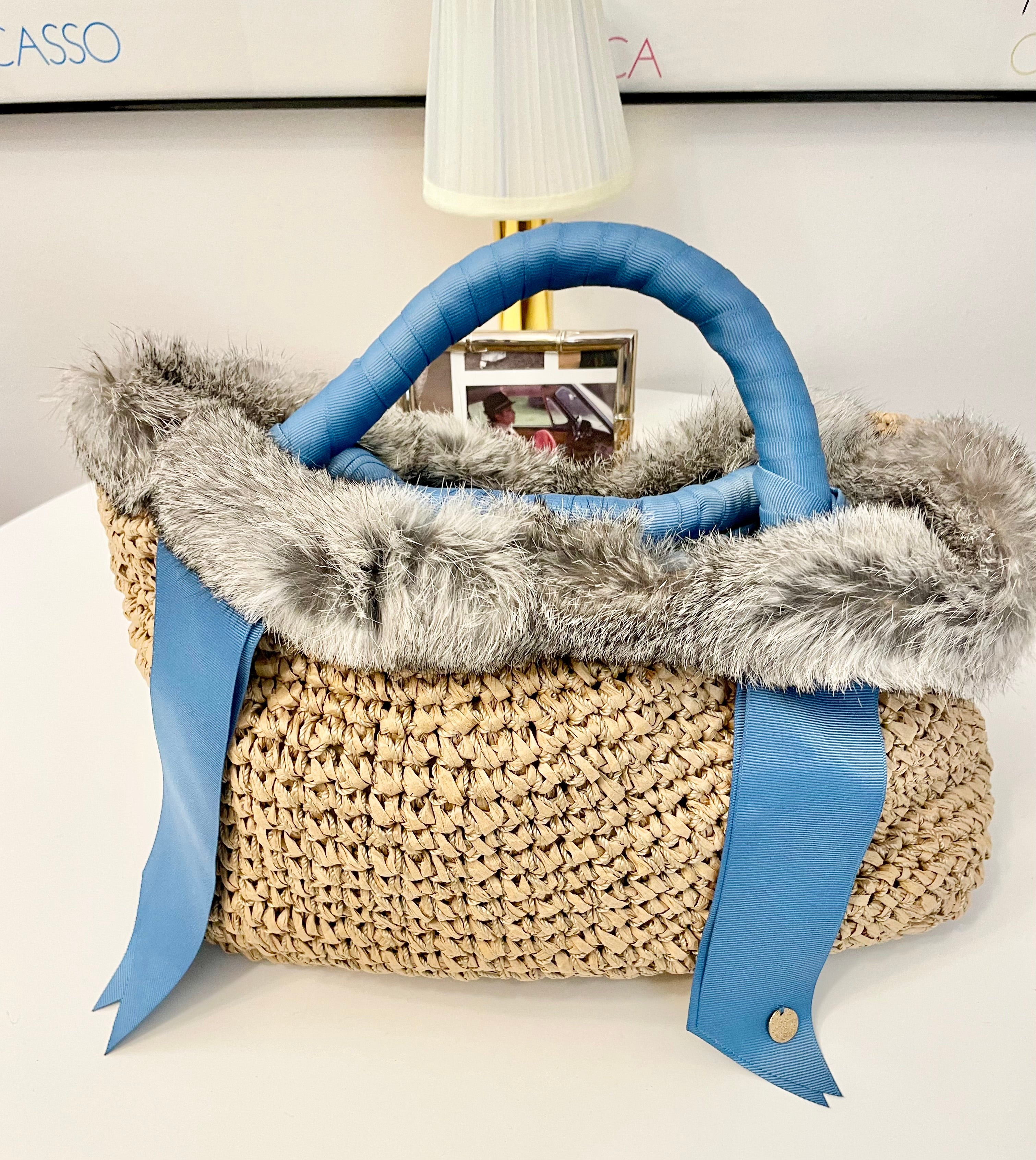Ladies on Holiday and her love of a sassy fur bag...