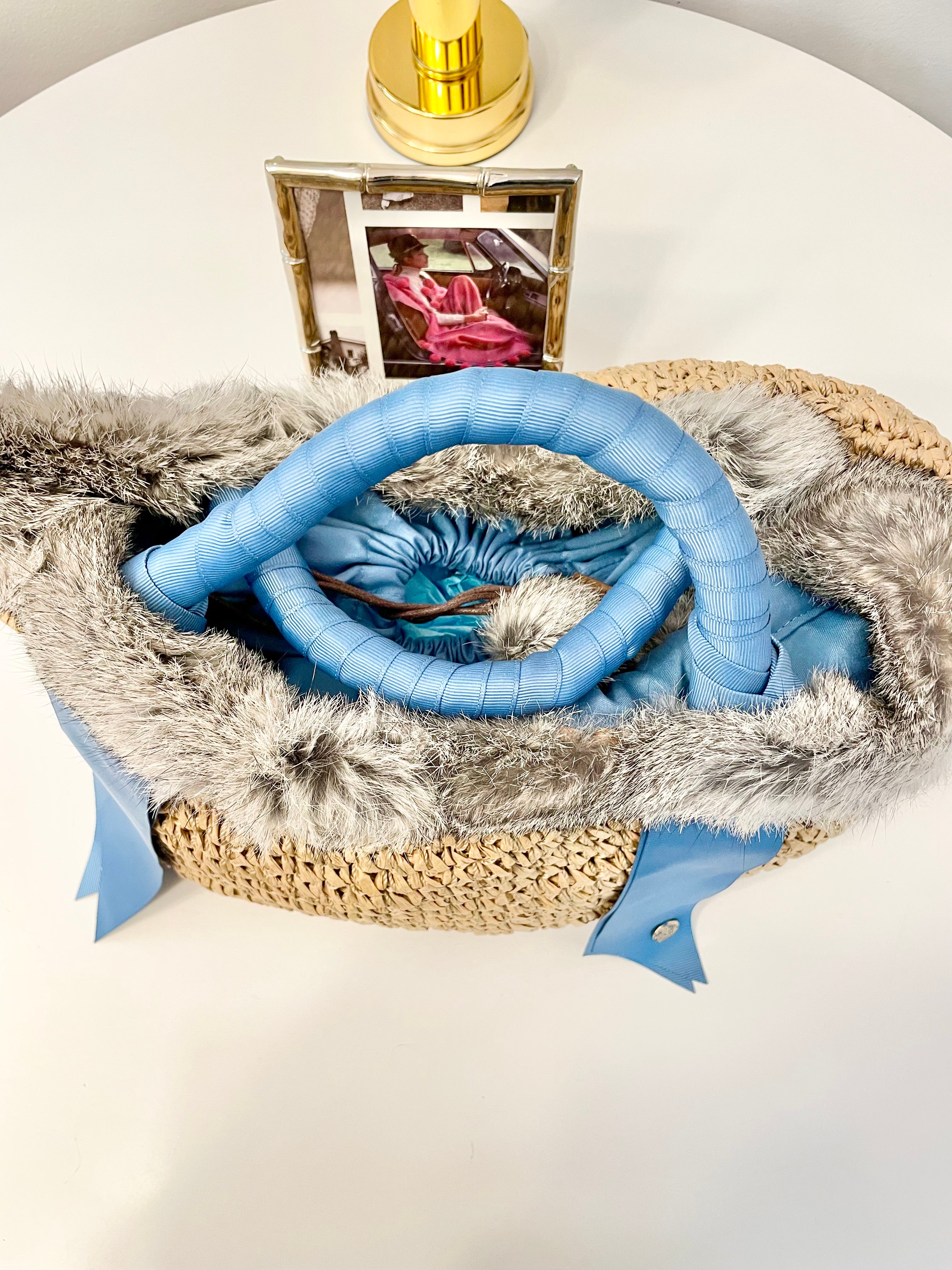 Ladies on Holiday and her love of a sassy fur bag...