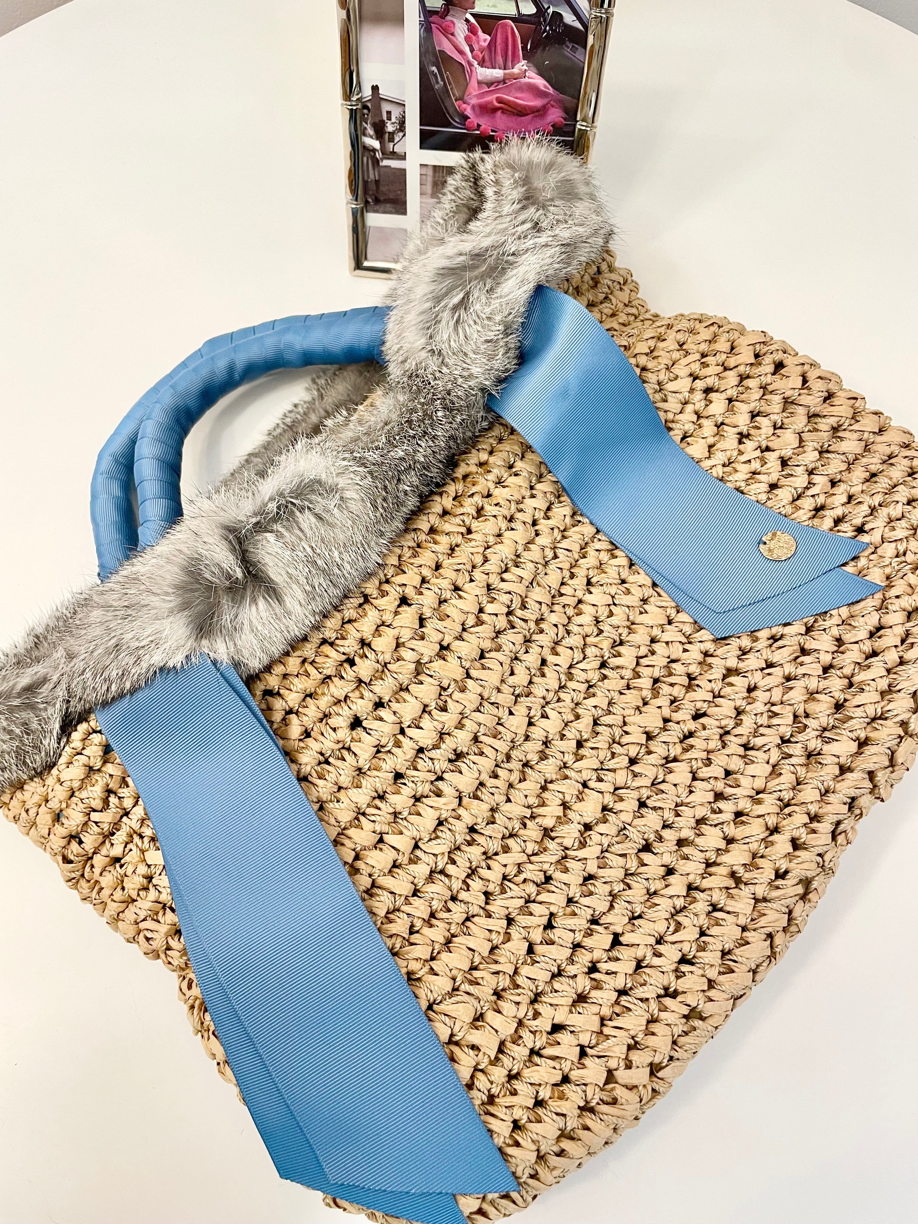 Ladies on Holiday and her love of a sassy fur bag...