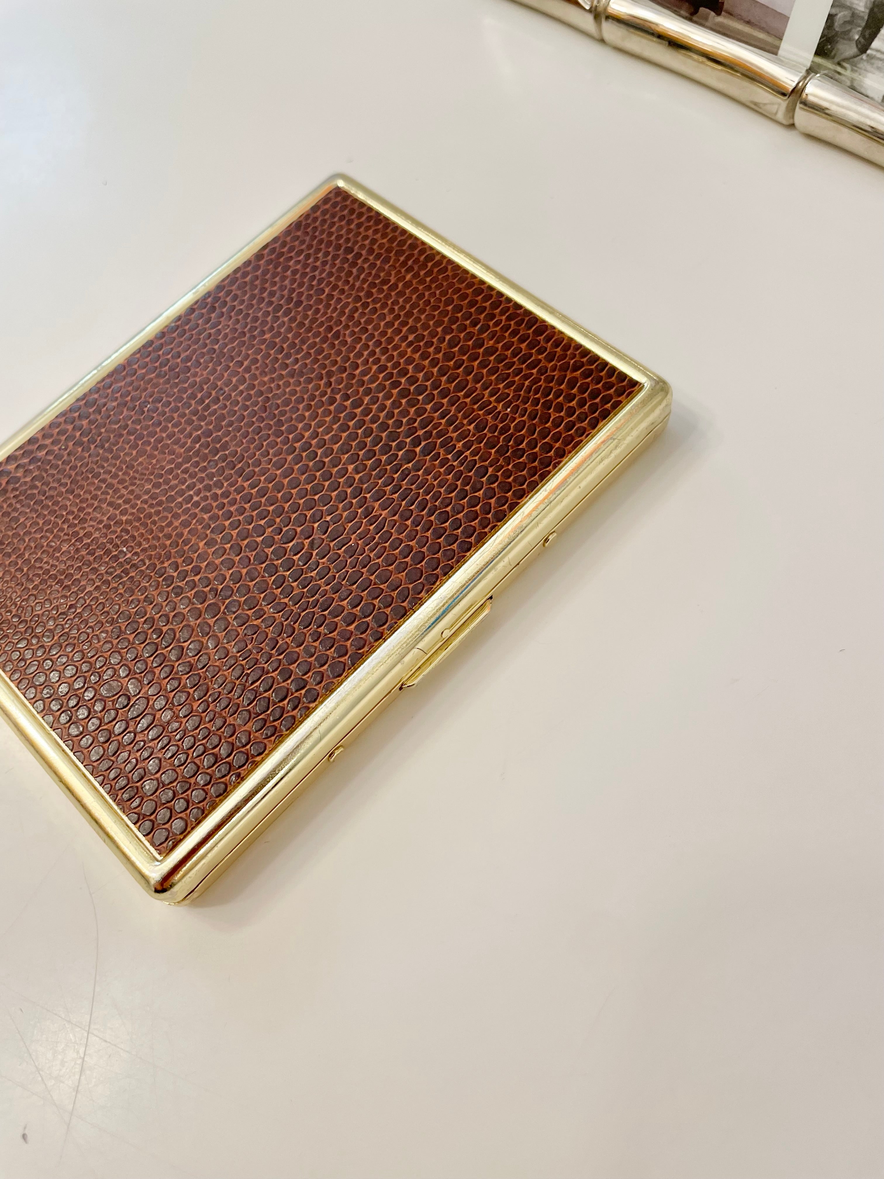 The most snazzy cigarette case... faux lizard!