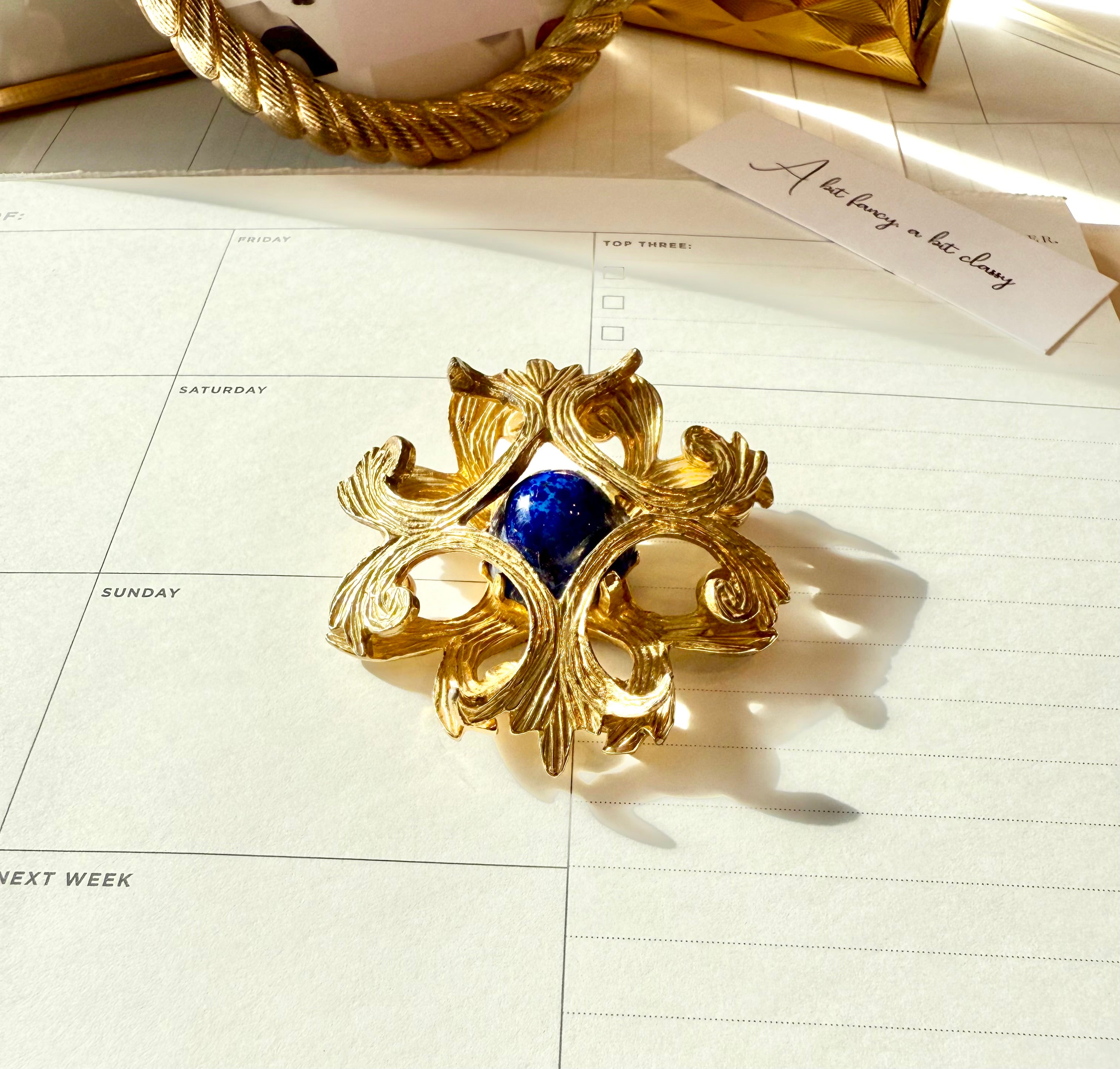 Regal, and classy Faux lapis Maltese cross brooch.... timeless