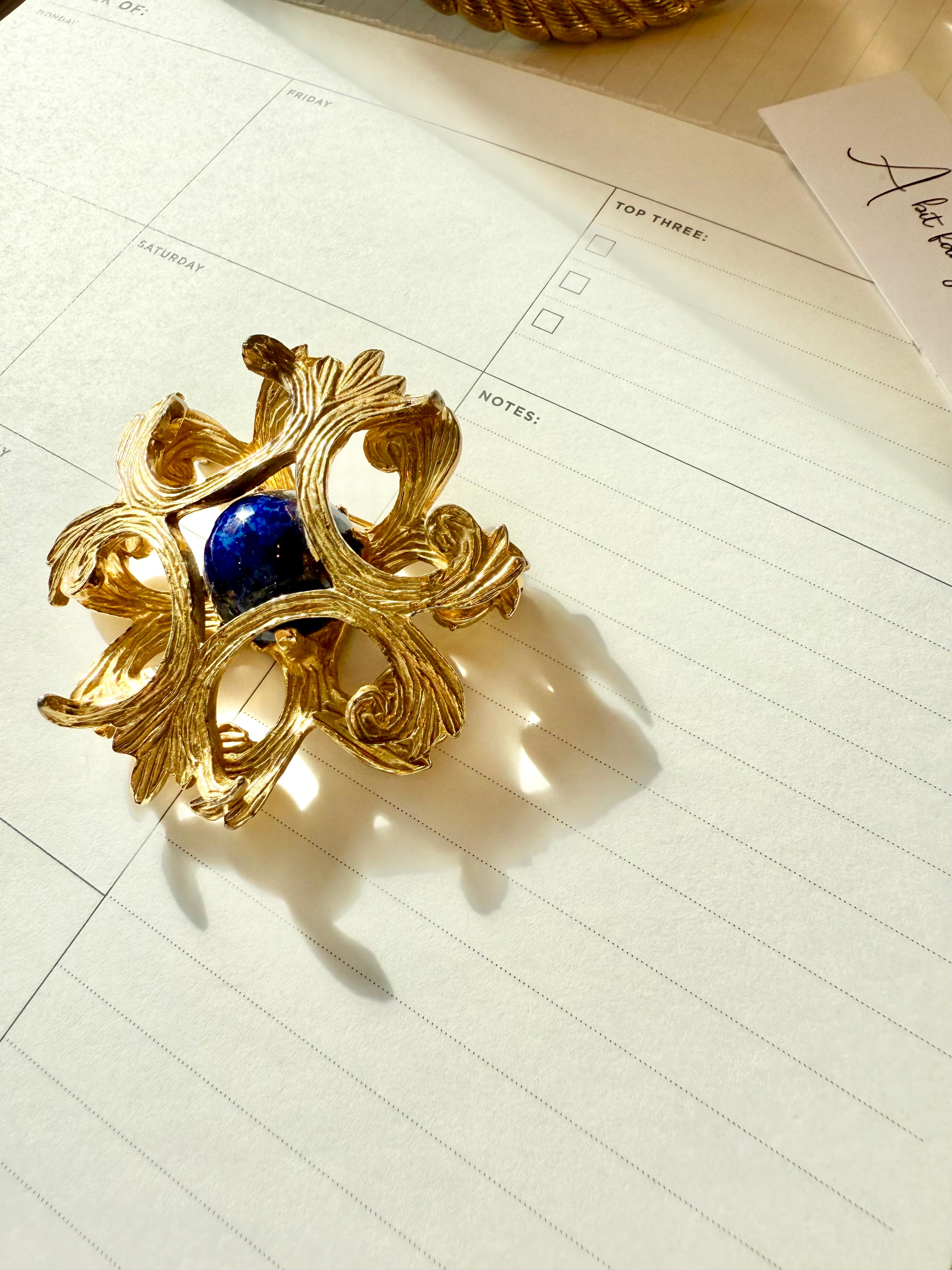 Regal, and classy Faux lapis Maltese cross brooch.... timeless