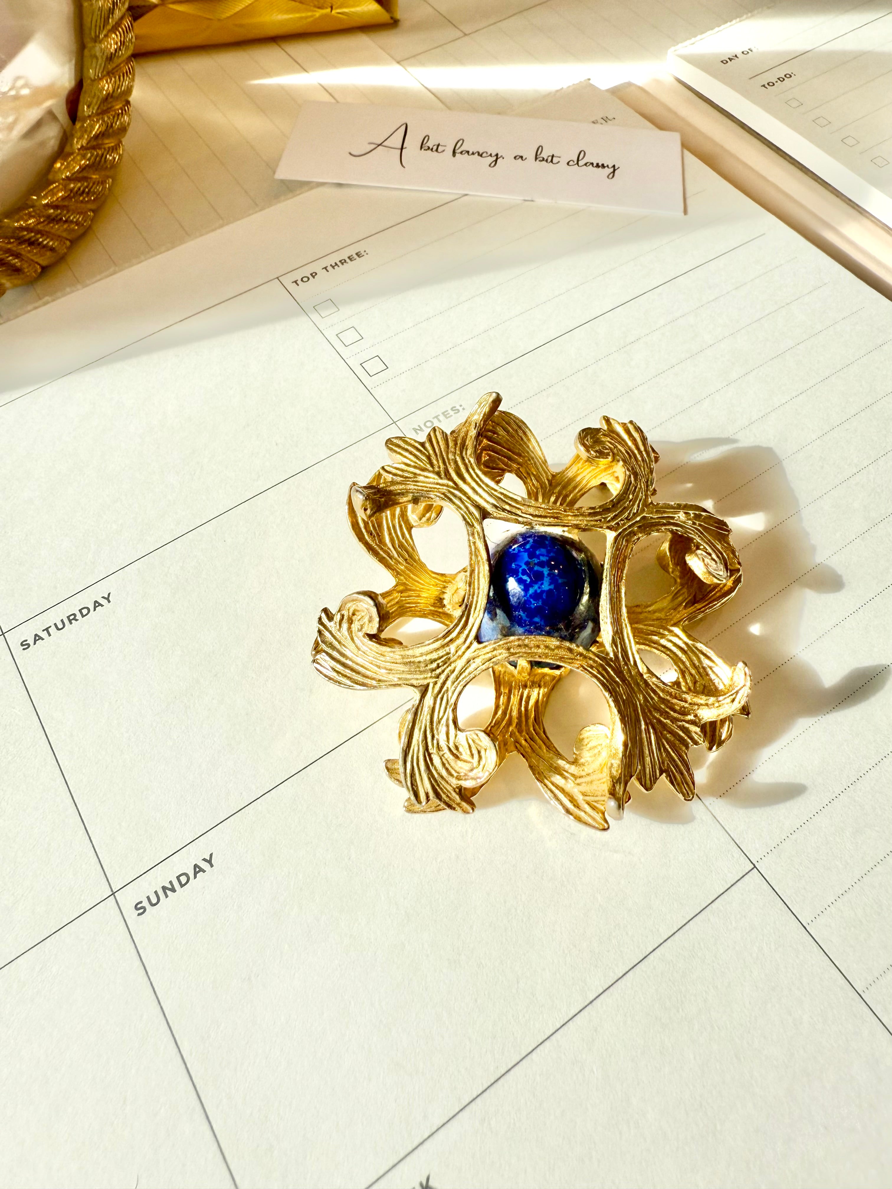 Regal, and classy Faux lapis Maltese cross brooch.... timeless