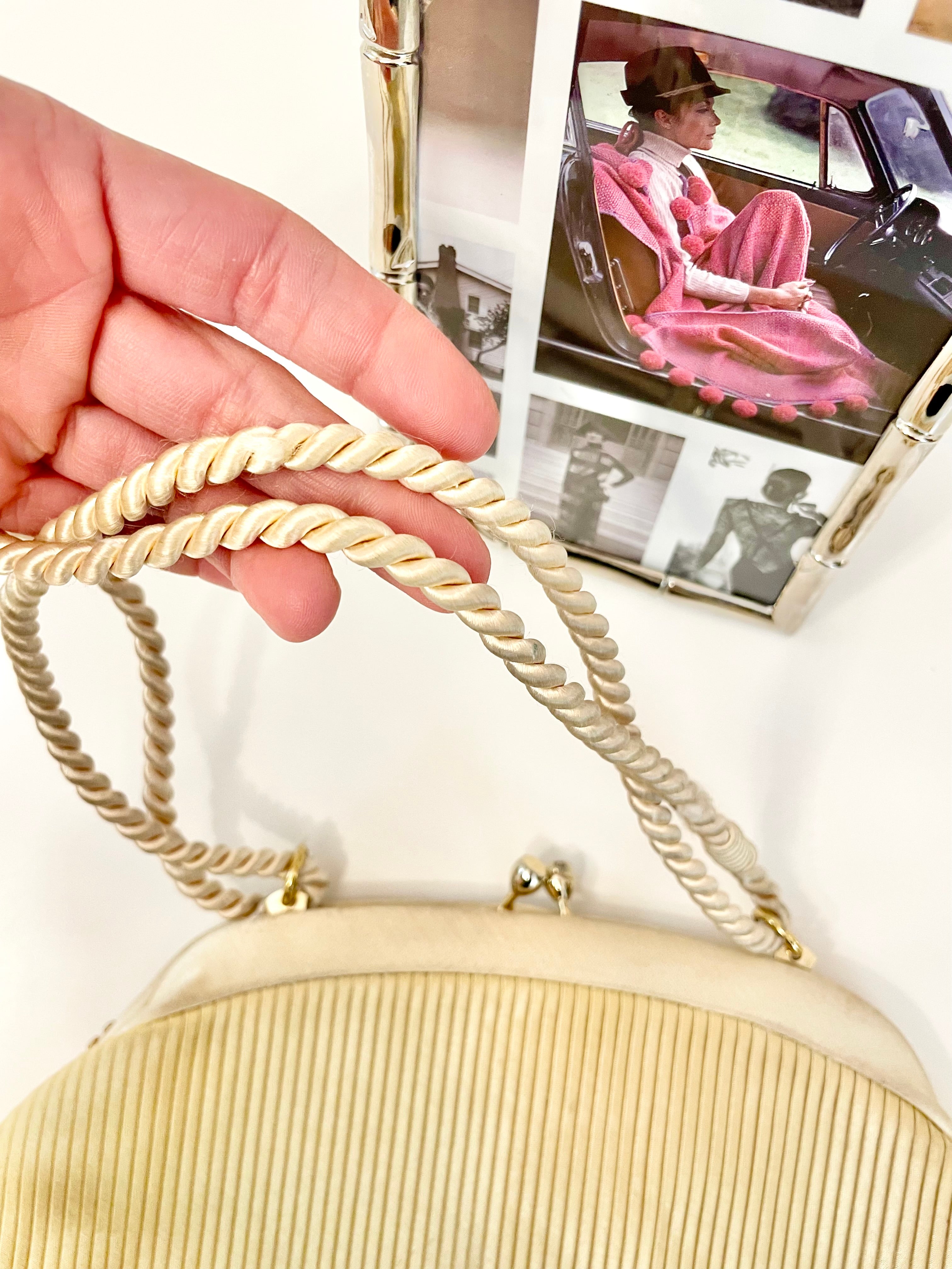The most lovely ivory satin pleated evening bag.... so chic