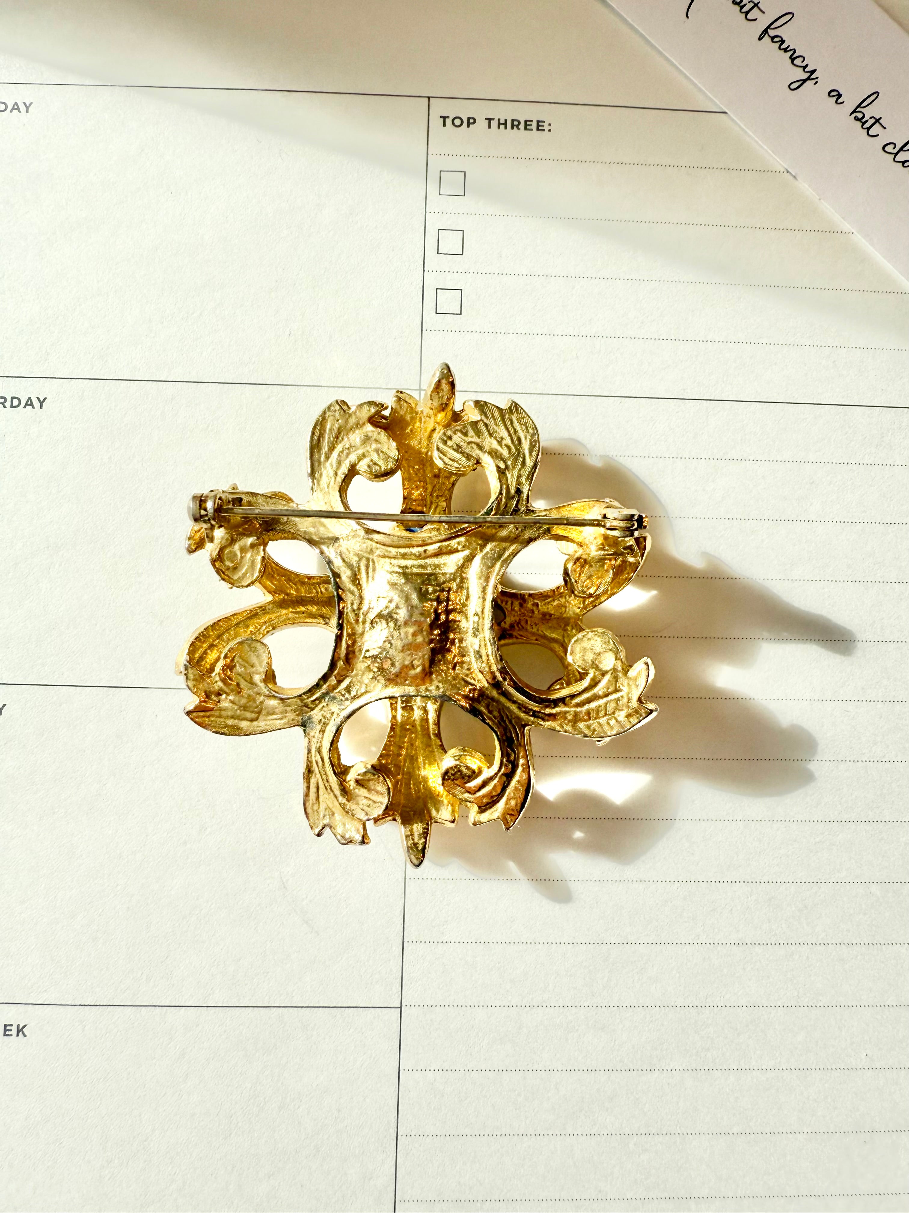 Regal, and classy Faux lapis Maltese cross brooch.... timeless
