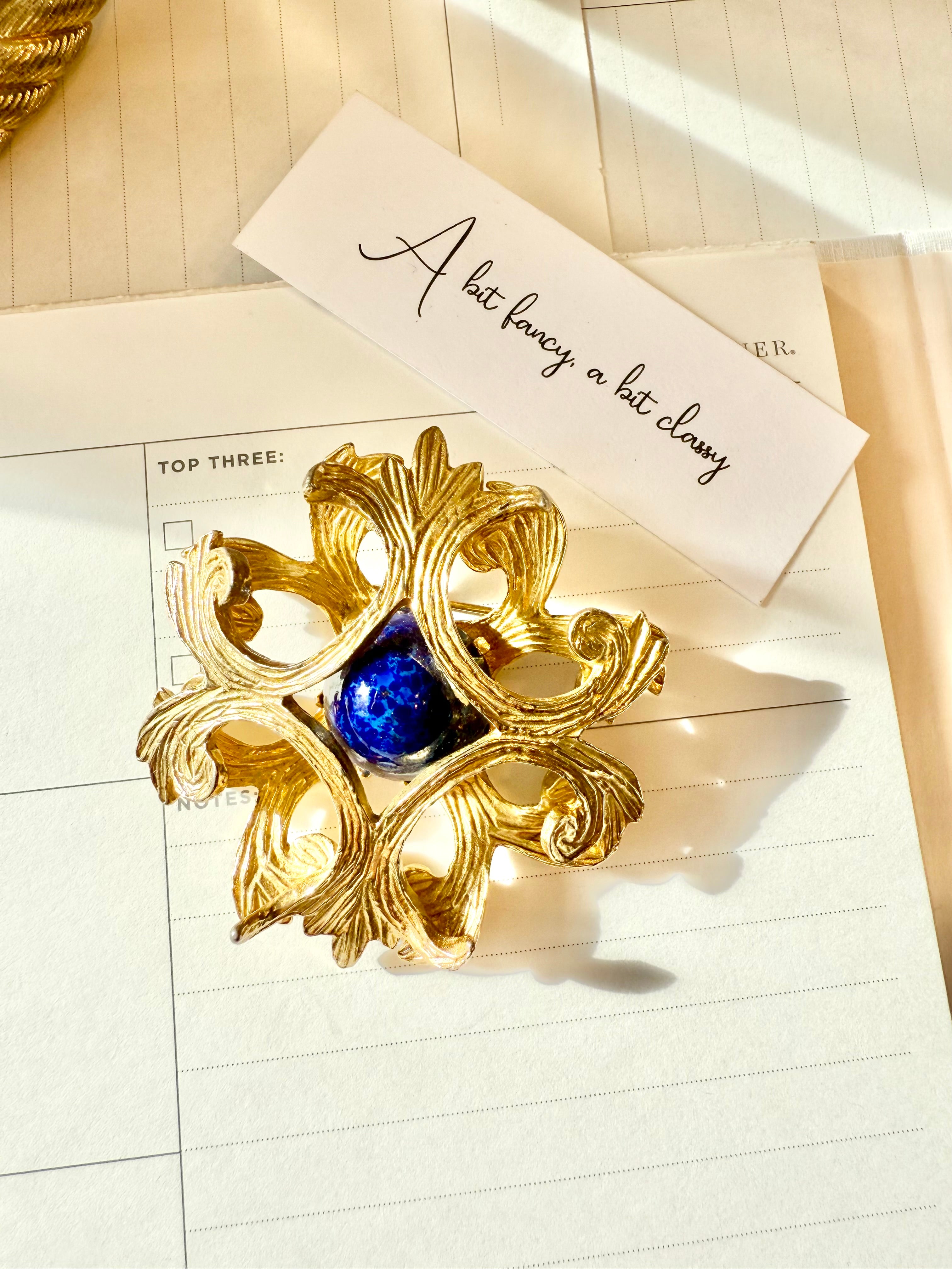 Regal, and classy Faux lapis Maltese cross brooch.... timeless