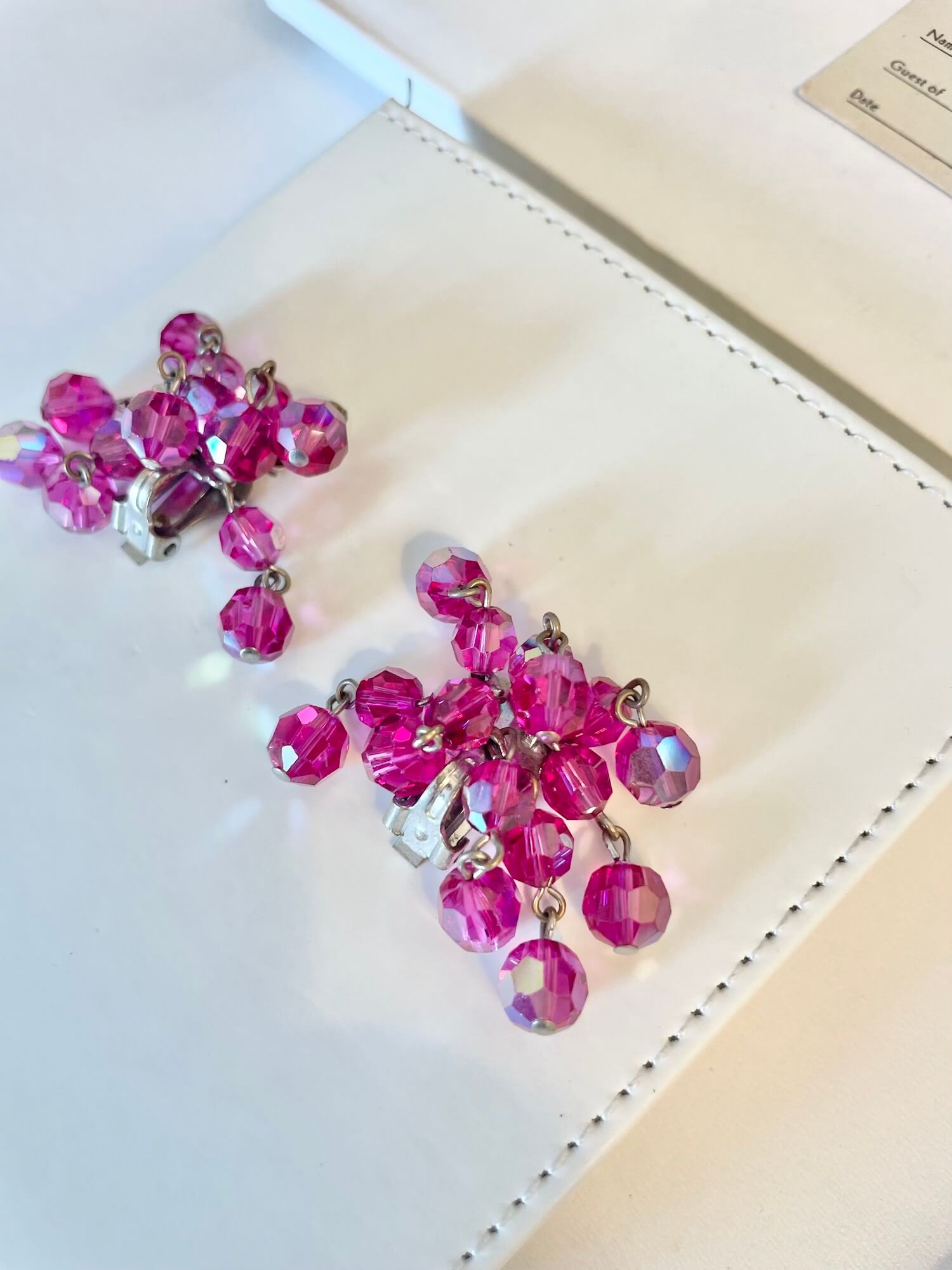 1960's Flirty gal magenta glass waterfall clip earrings