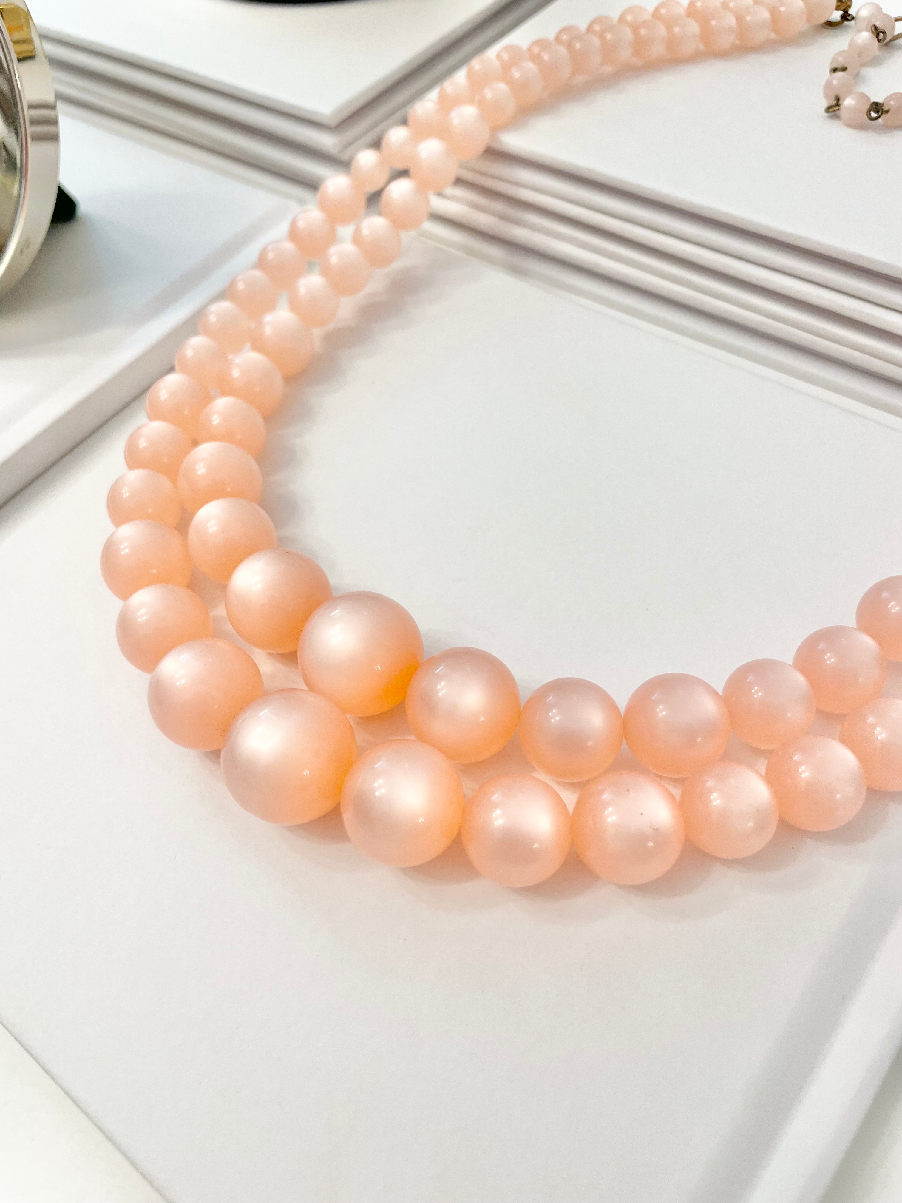 The most beautiful blush colored moon glow, classy double strand necklace...Oh so feminine