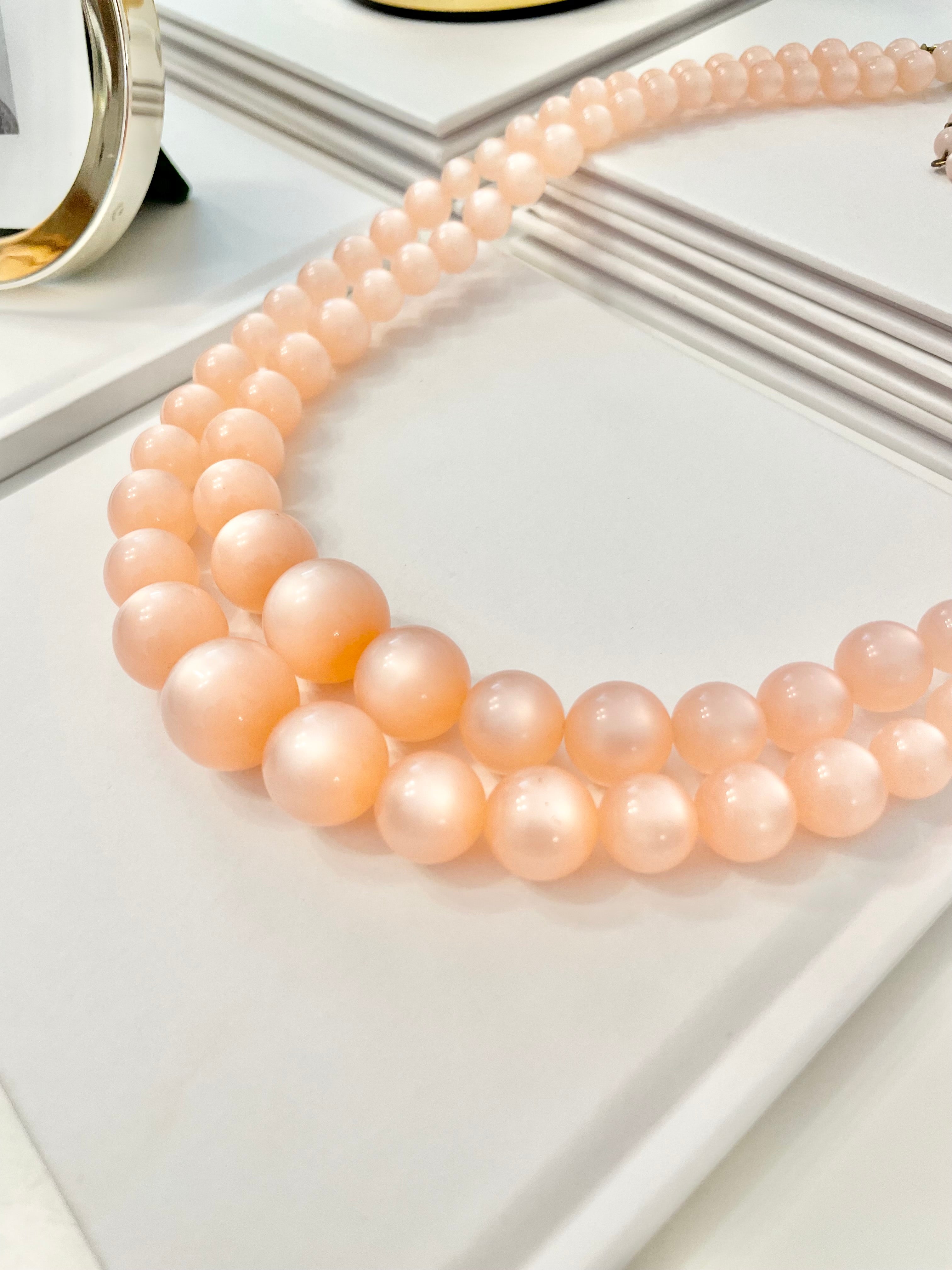 The most beautiful blush colored moon glow, classy double strand necklace...Oh so feminine
