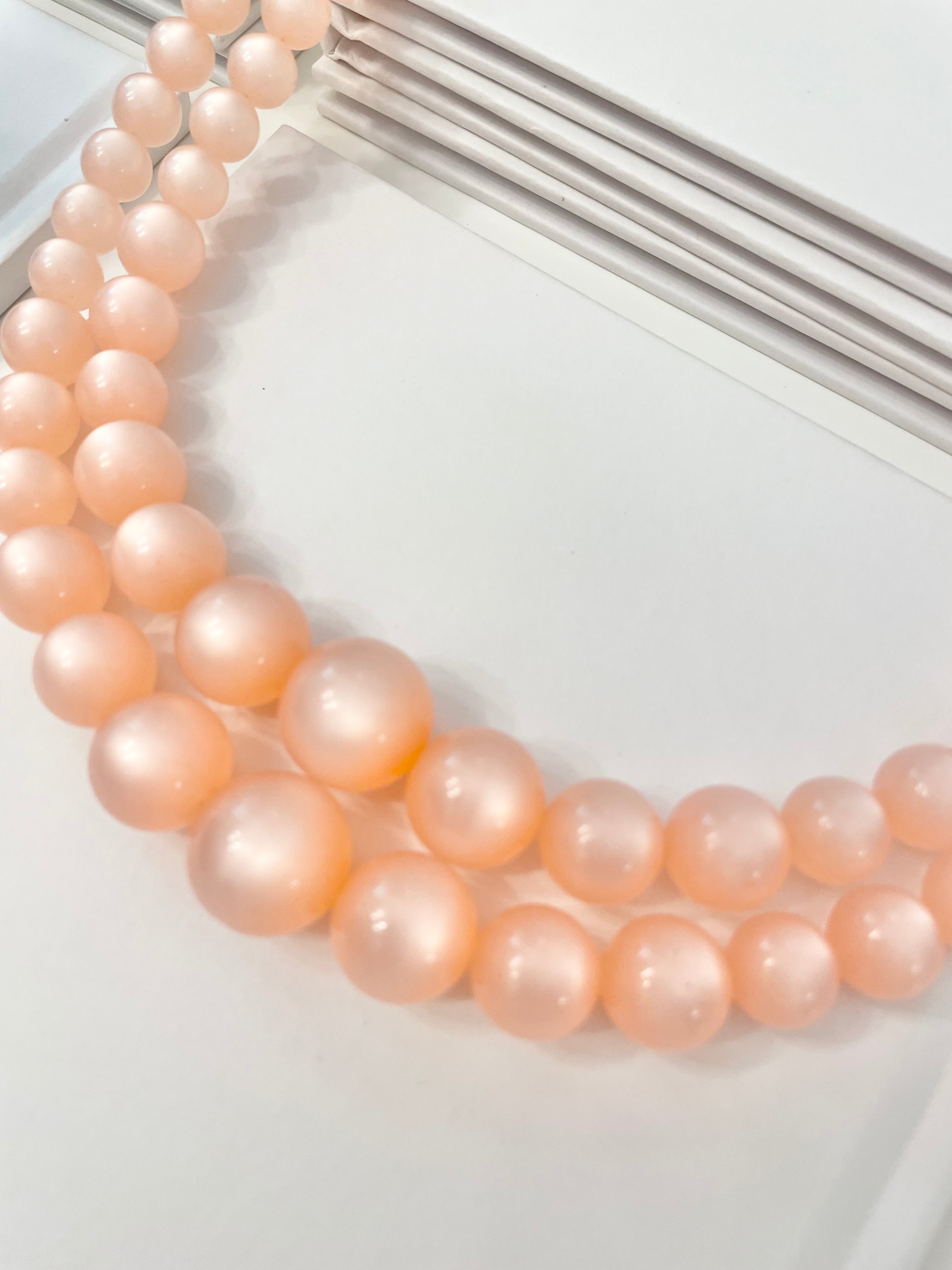 The most beautiful blush colored moon glow, classy double strand necklace...Oh so feminine