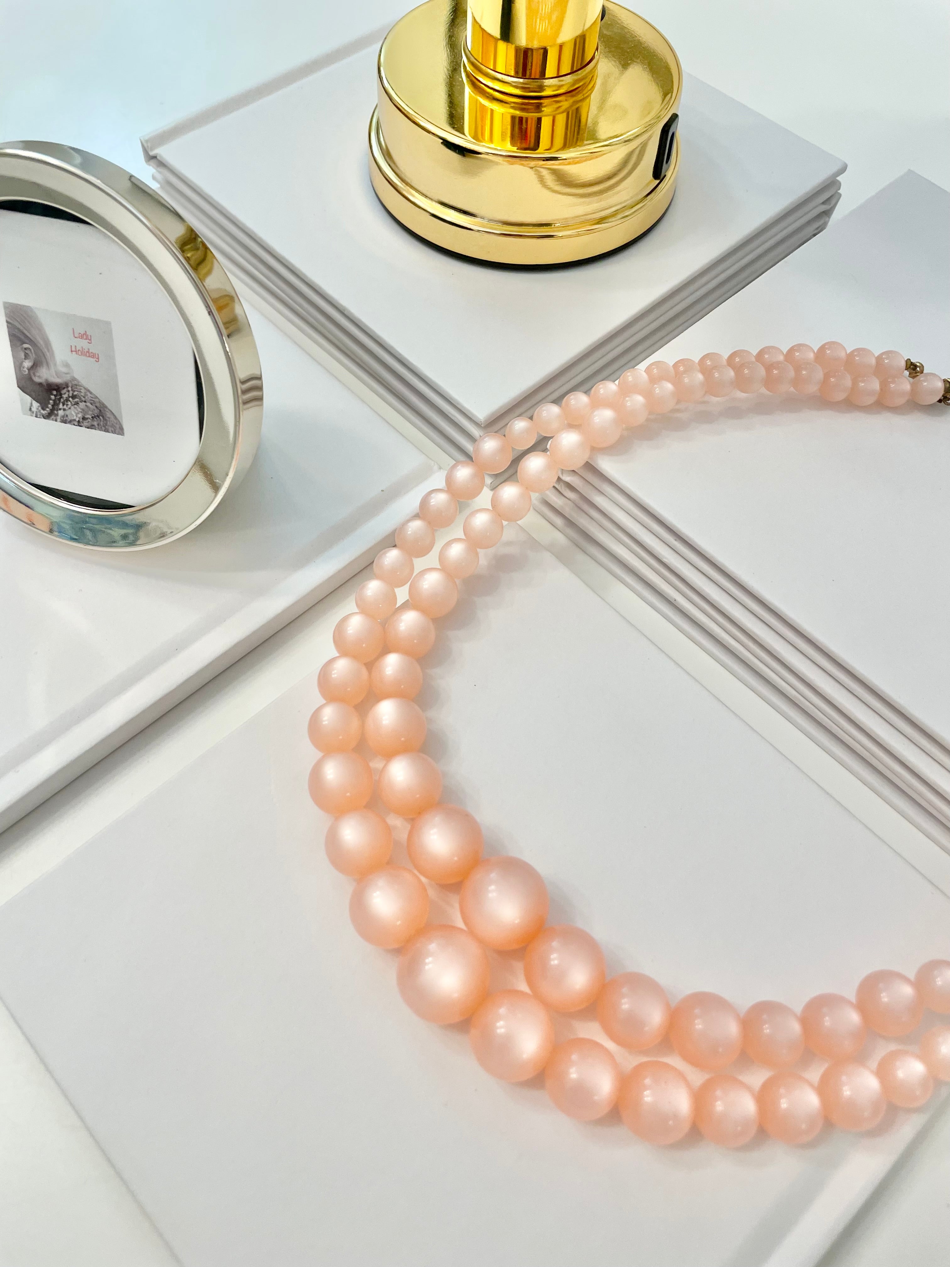 The most beautiful blush colored moon glow, classy double strand necklace...Oh so feminine