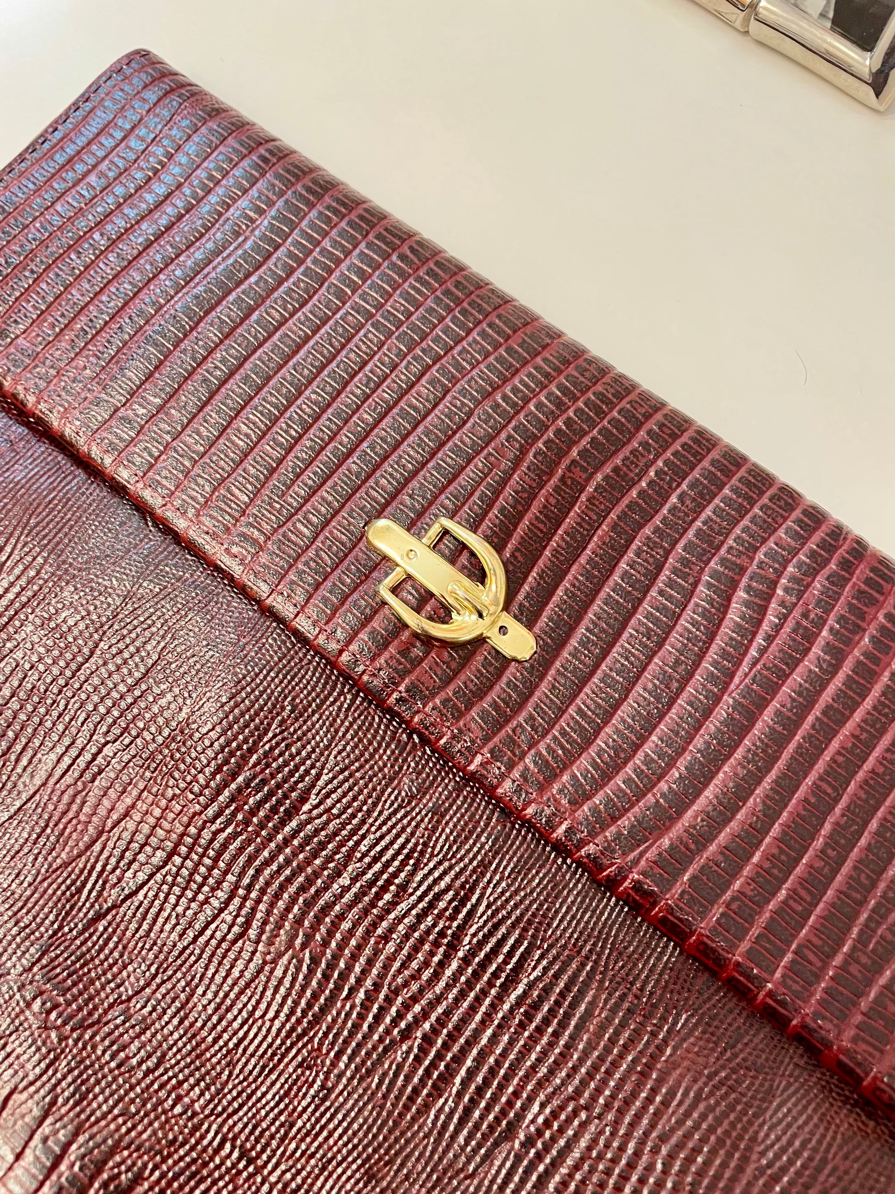 1970's faux lizard envelop bag with sassy gold adornment... so lovely