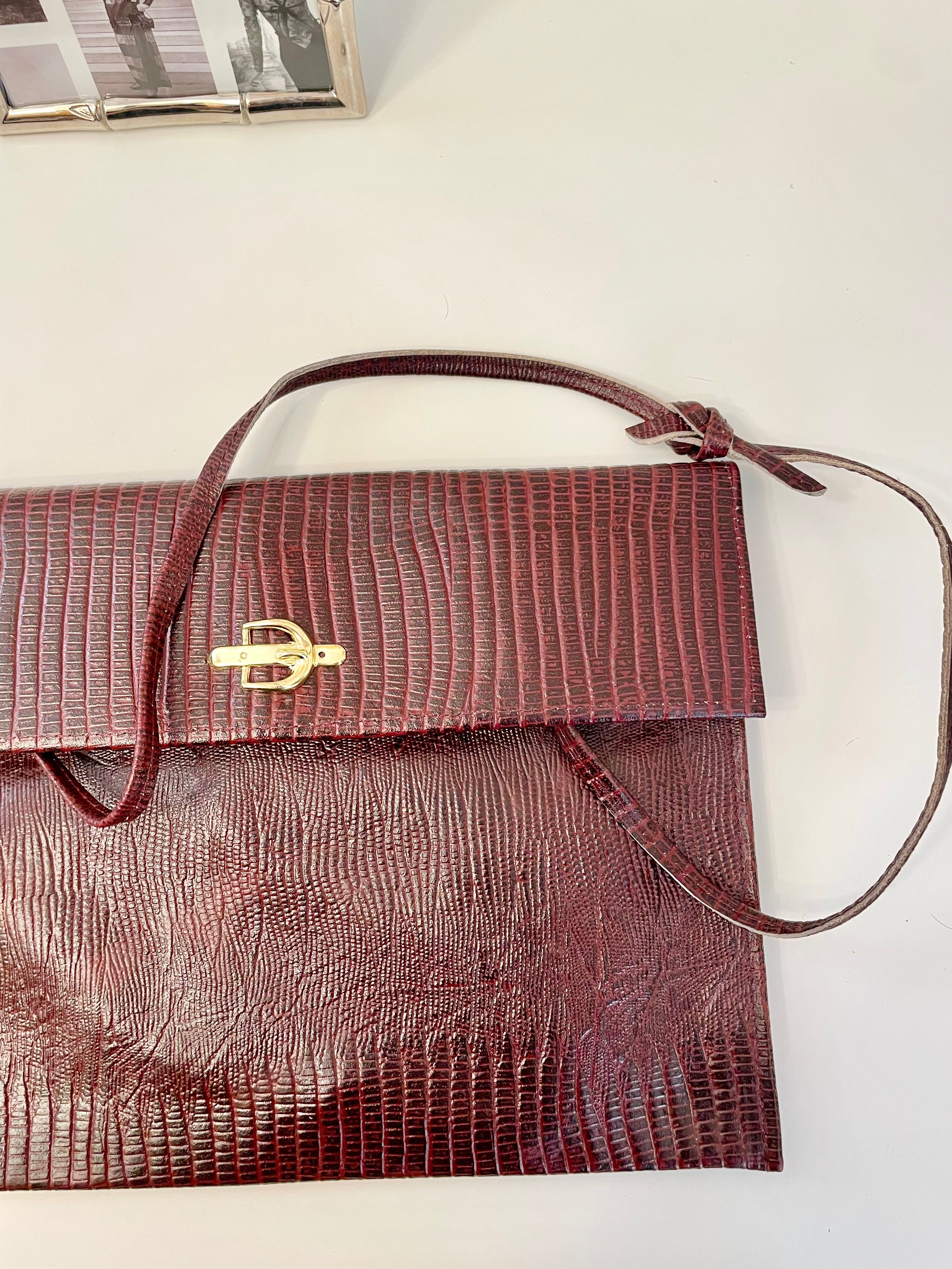 1970's faux lizard envelop bag with sassy gold adornment... so lovely