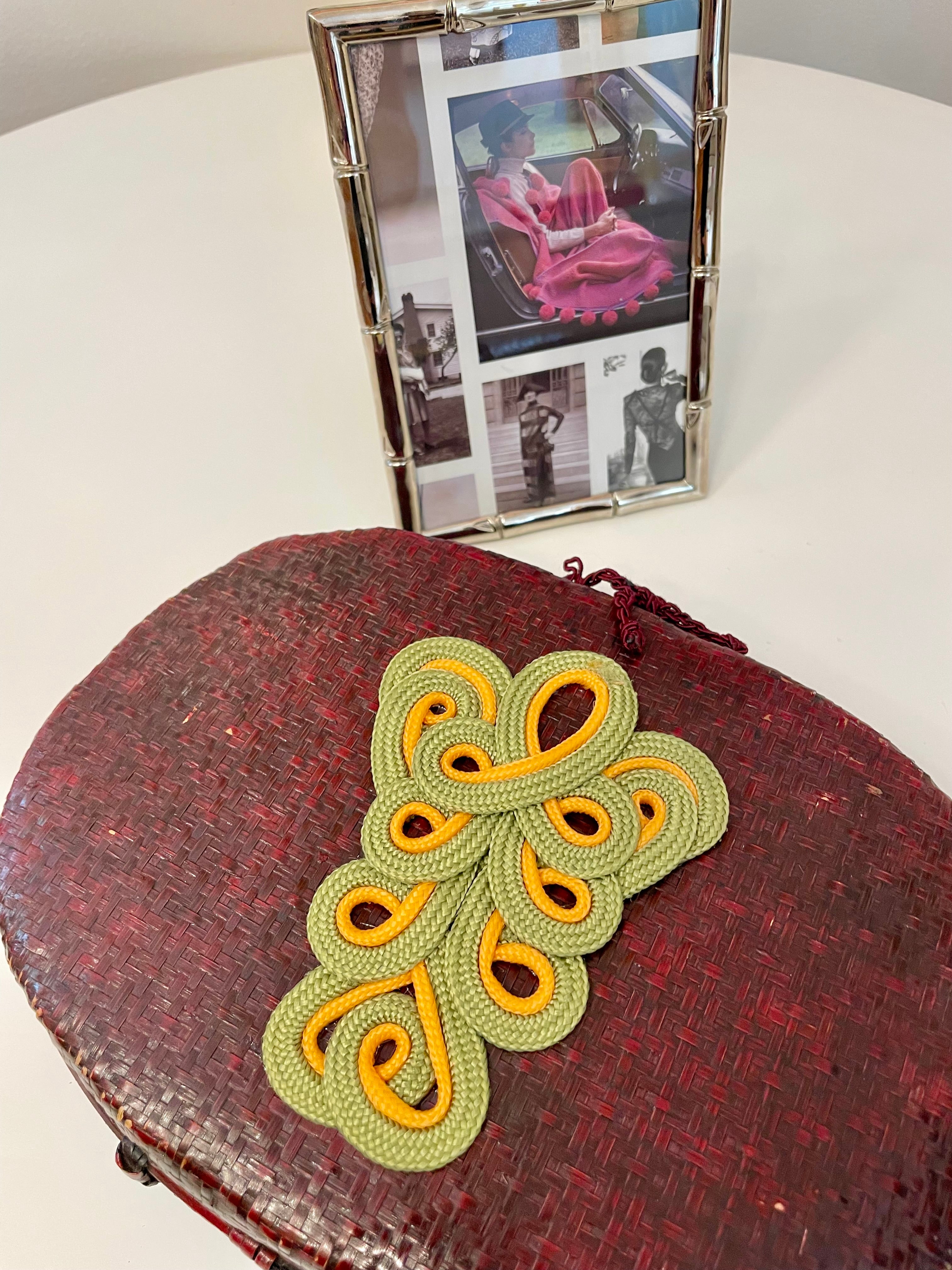 1950's French wicker clutch bag with sassy adornment..