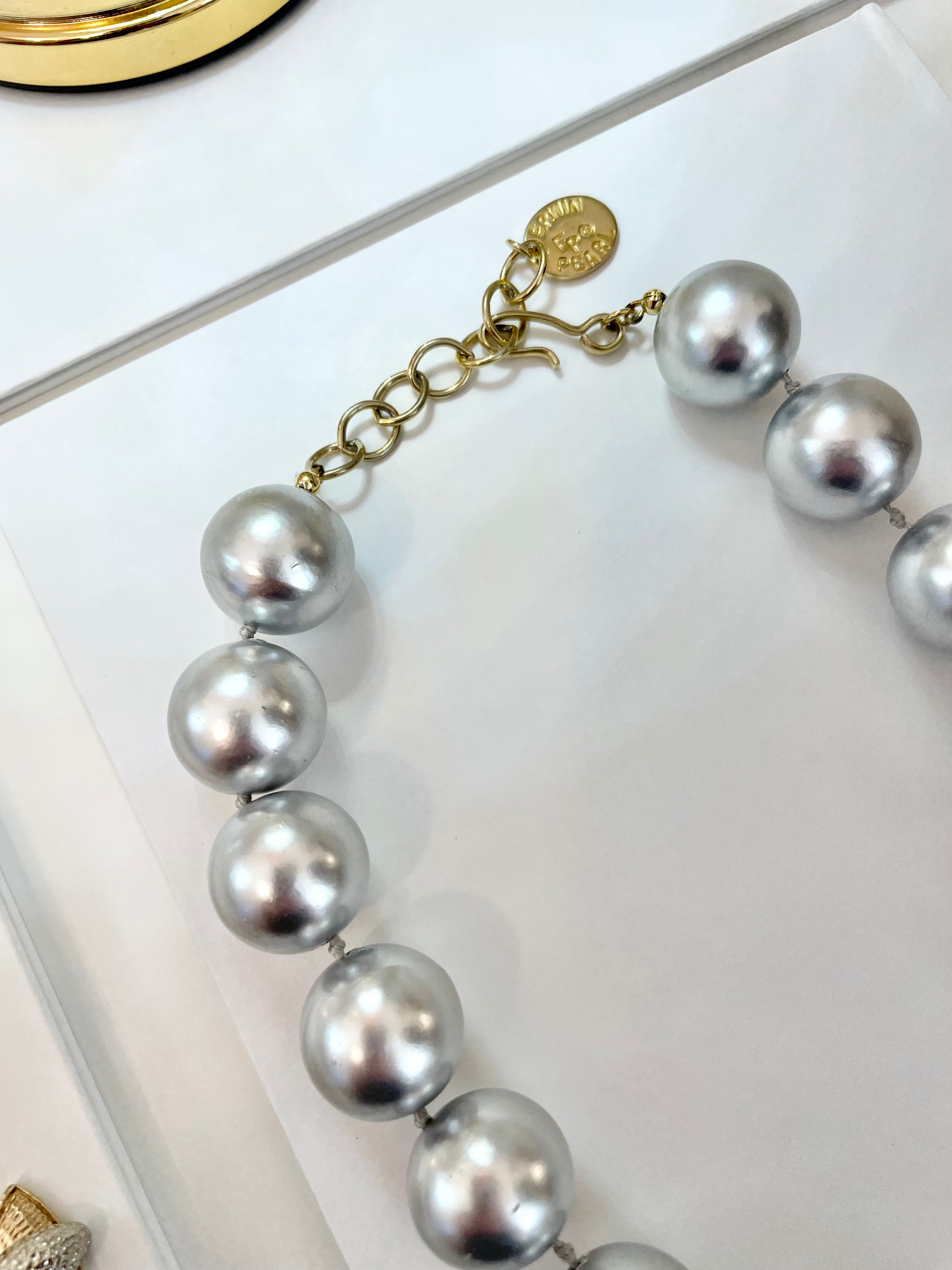 Any lady adores a pair of gray pearls... so divine! Truly special Erwin Pearl necklace...
