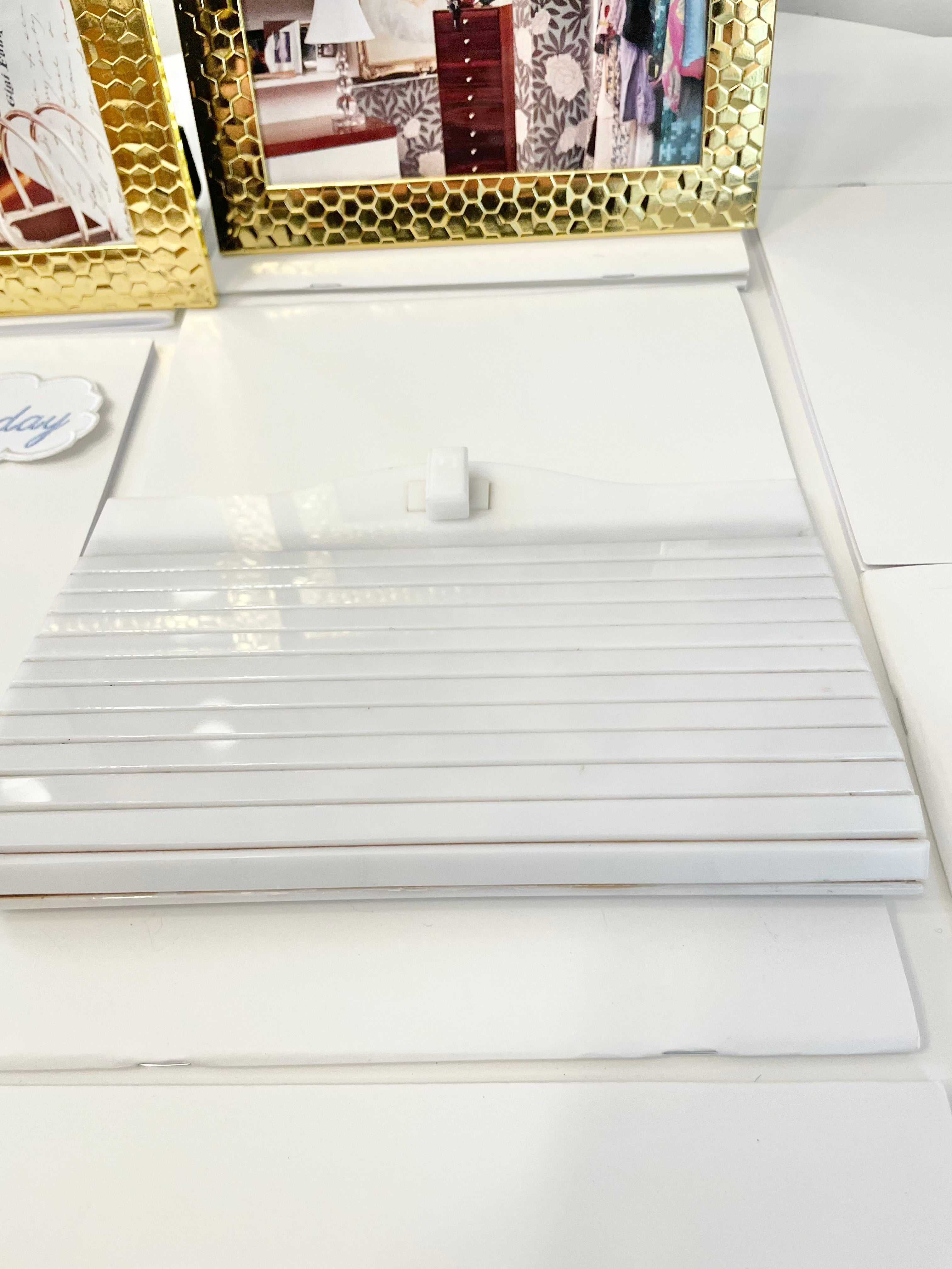 The most divine blanc plastic mod style clutch bag.... so feminine!