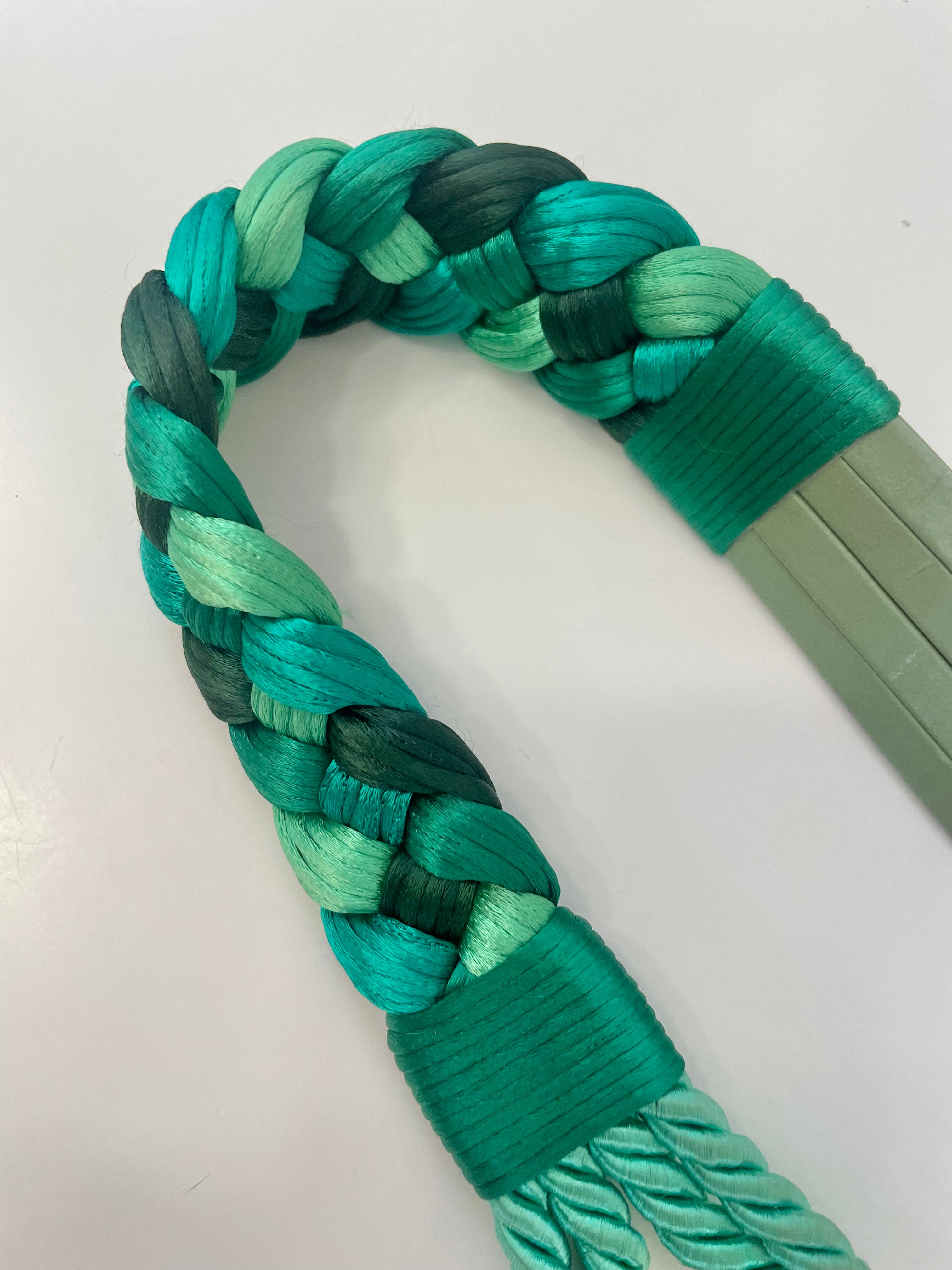 A truly special 1970's belt. I adore this green braided design... oh so chic.