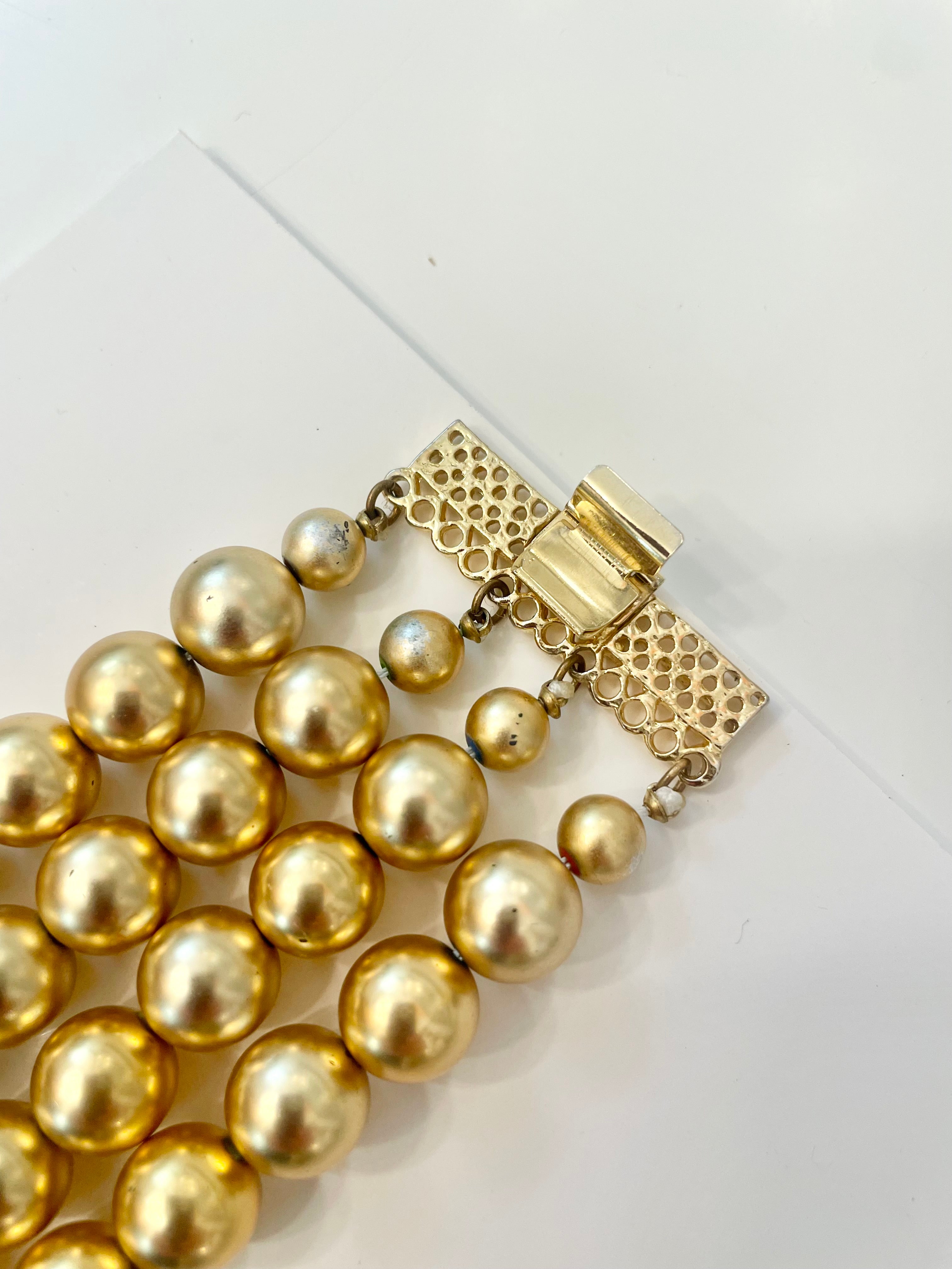 The most charming gold ball multi strand bracelet. ...so darling
