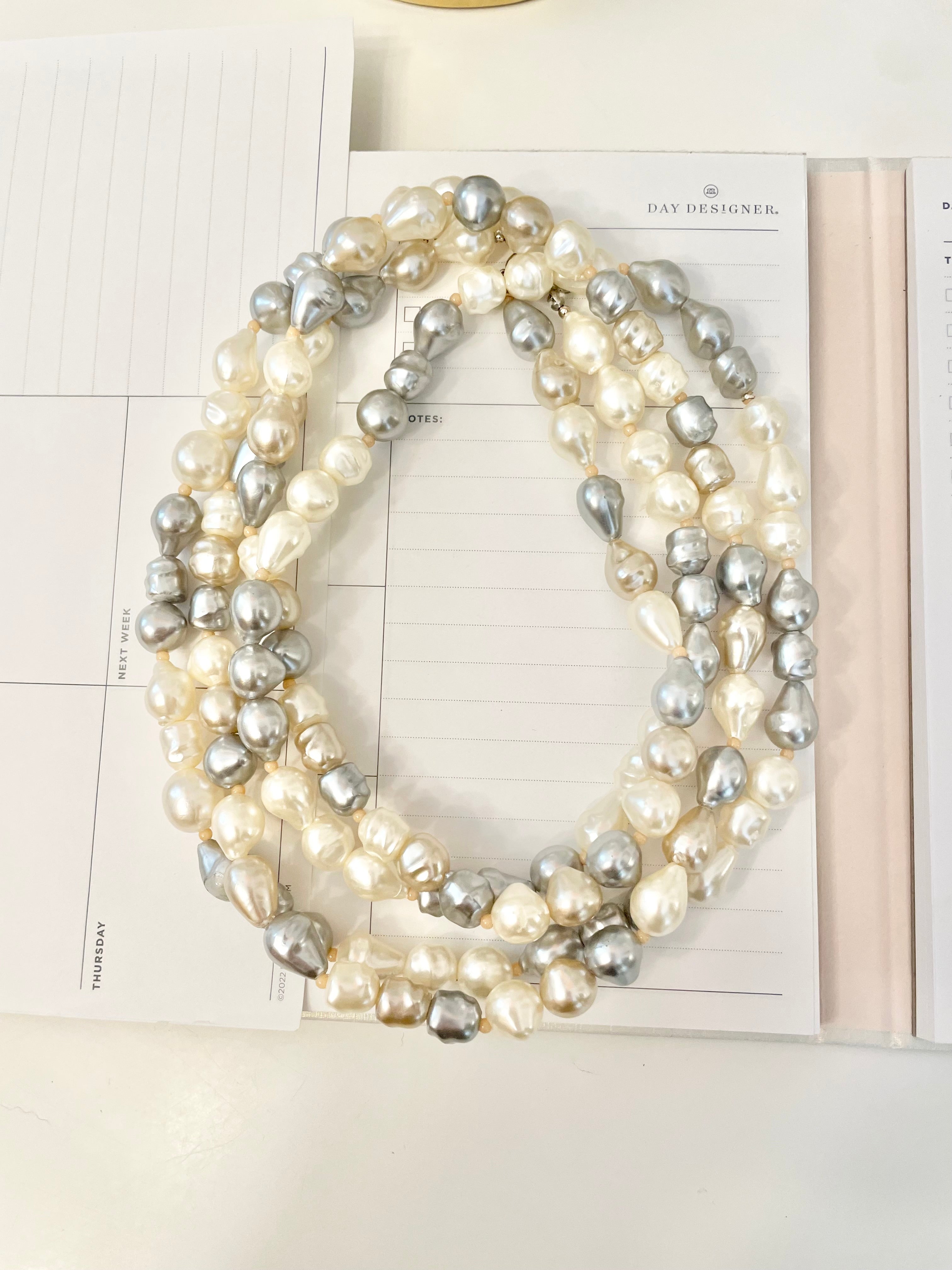 Lovely faux opera length pearls... so chic