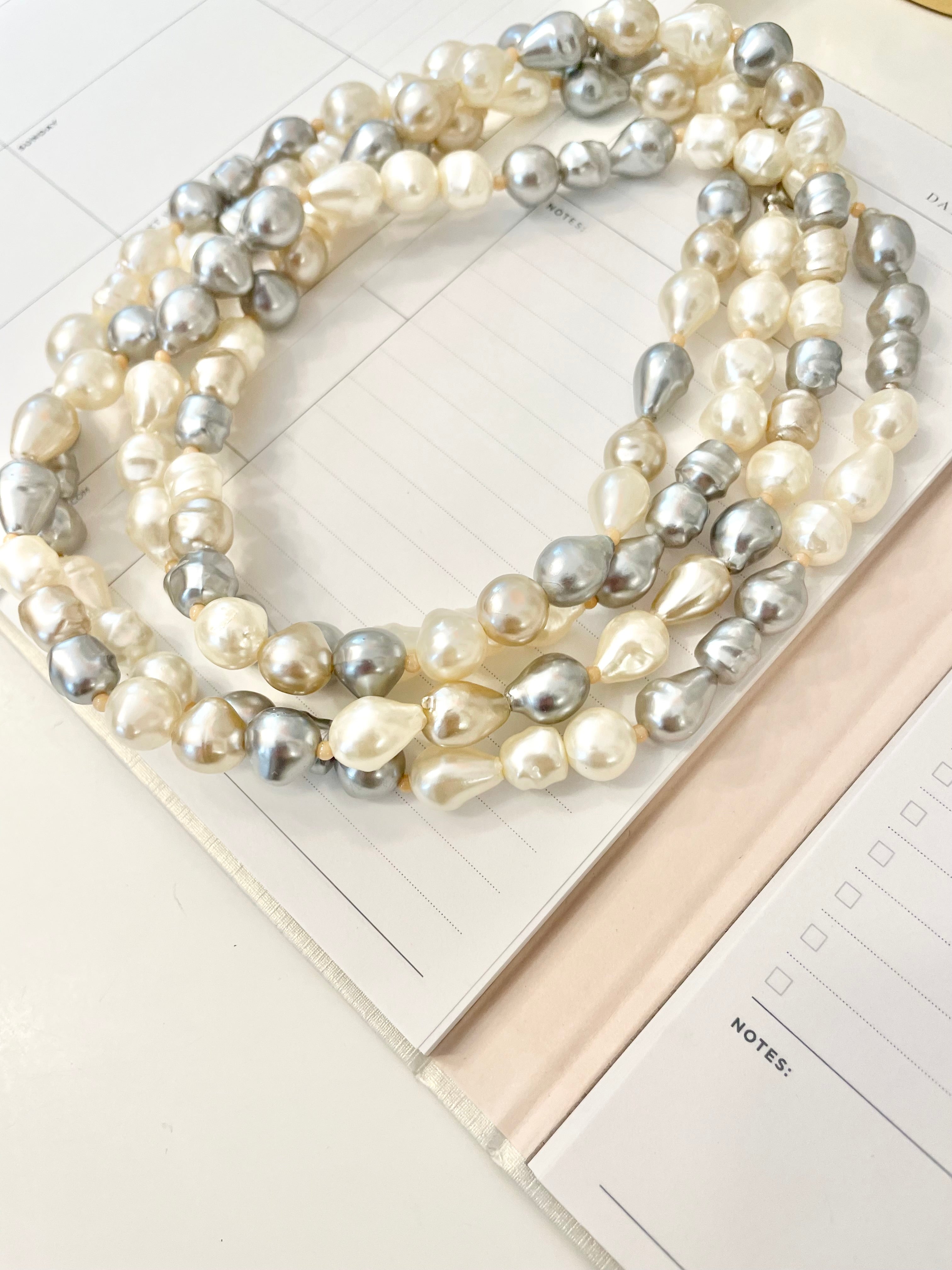 Lovely faux opera length pearls... so chic