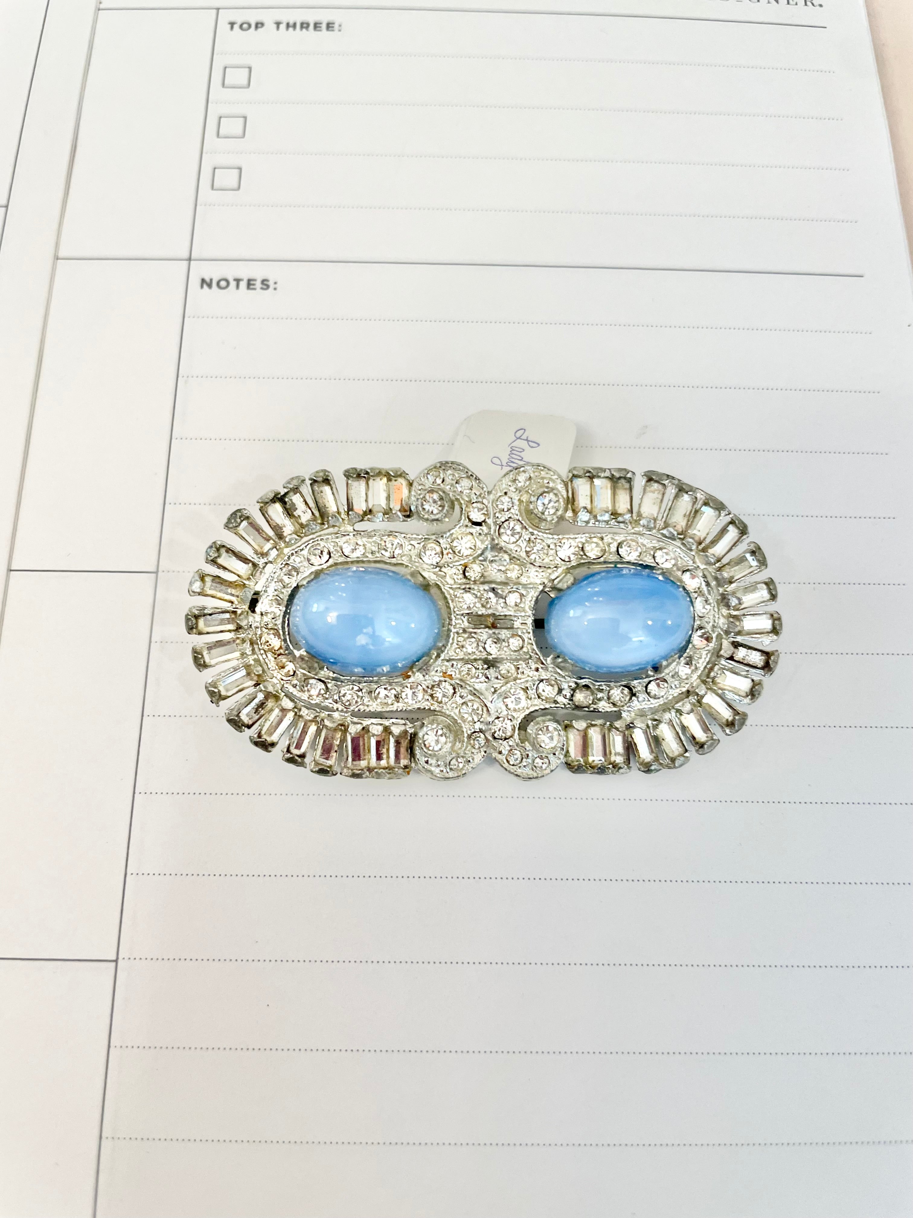 1940's stunning deco style brooch... I adore the blue moon glow glass stones.