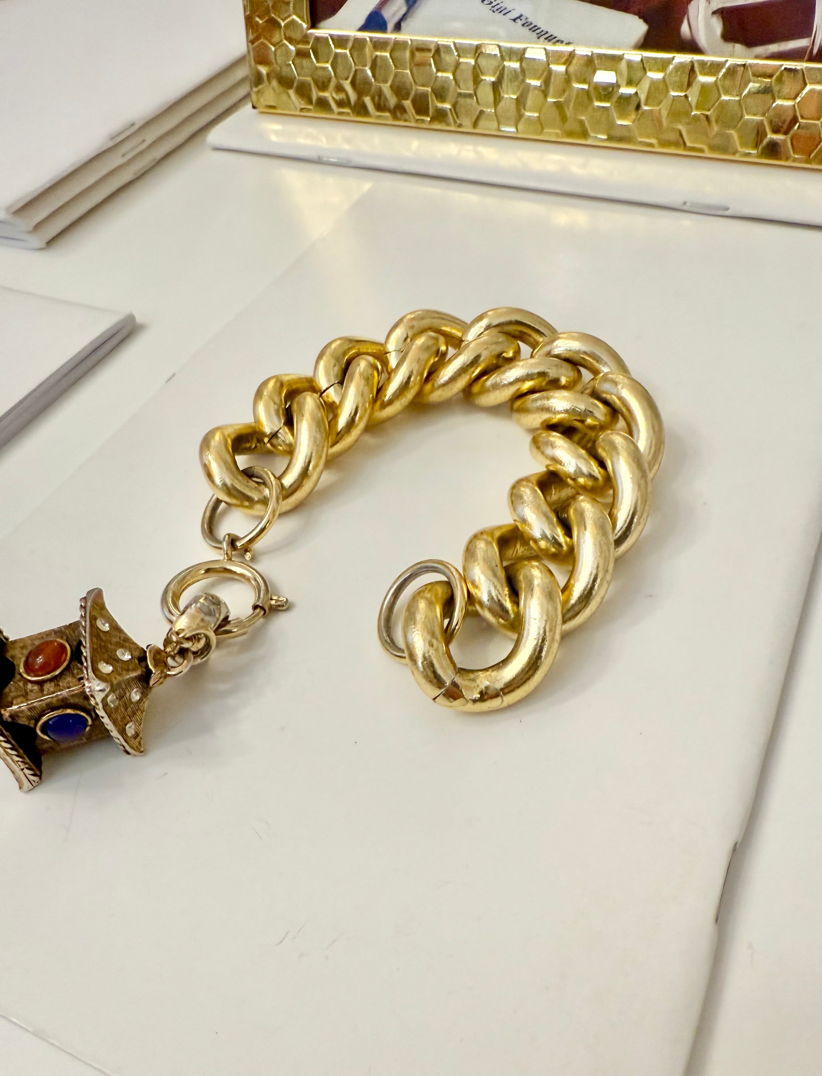 The most charming gold link bracelet... so extraordinary.