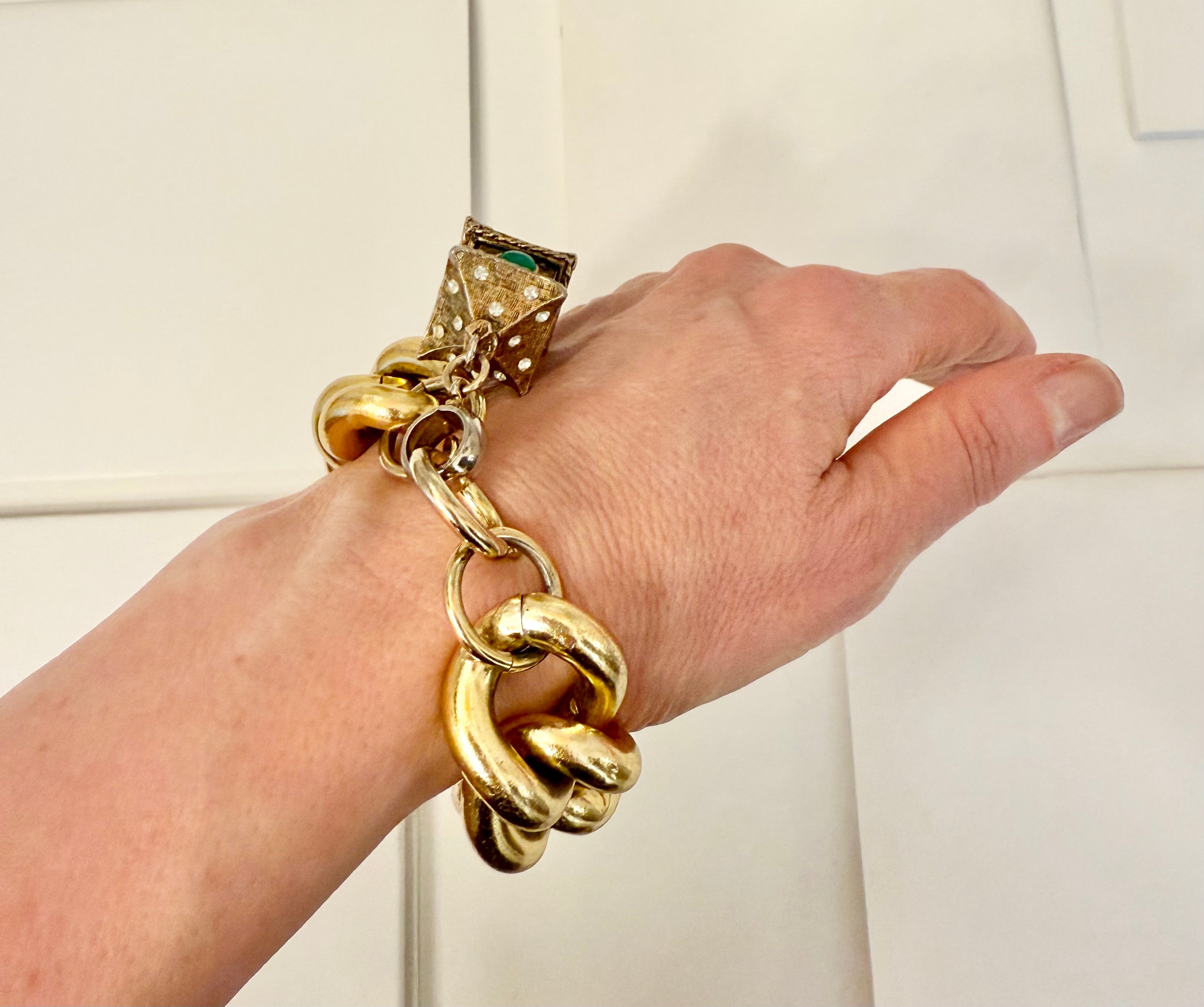 The most charming gold link bracelet... so extraordinary.