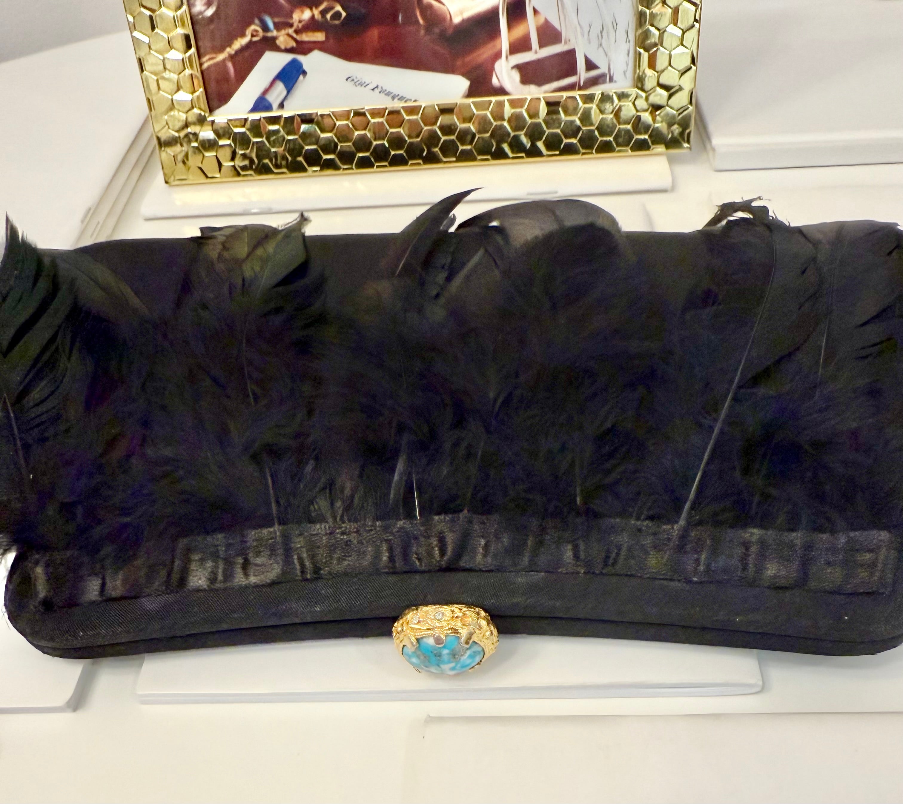 The most divine feather satin clutch... so divine
