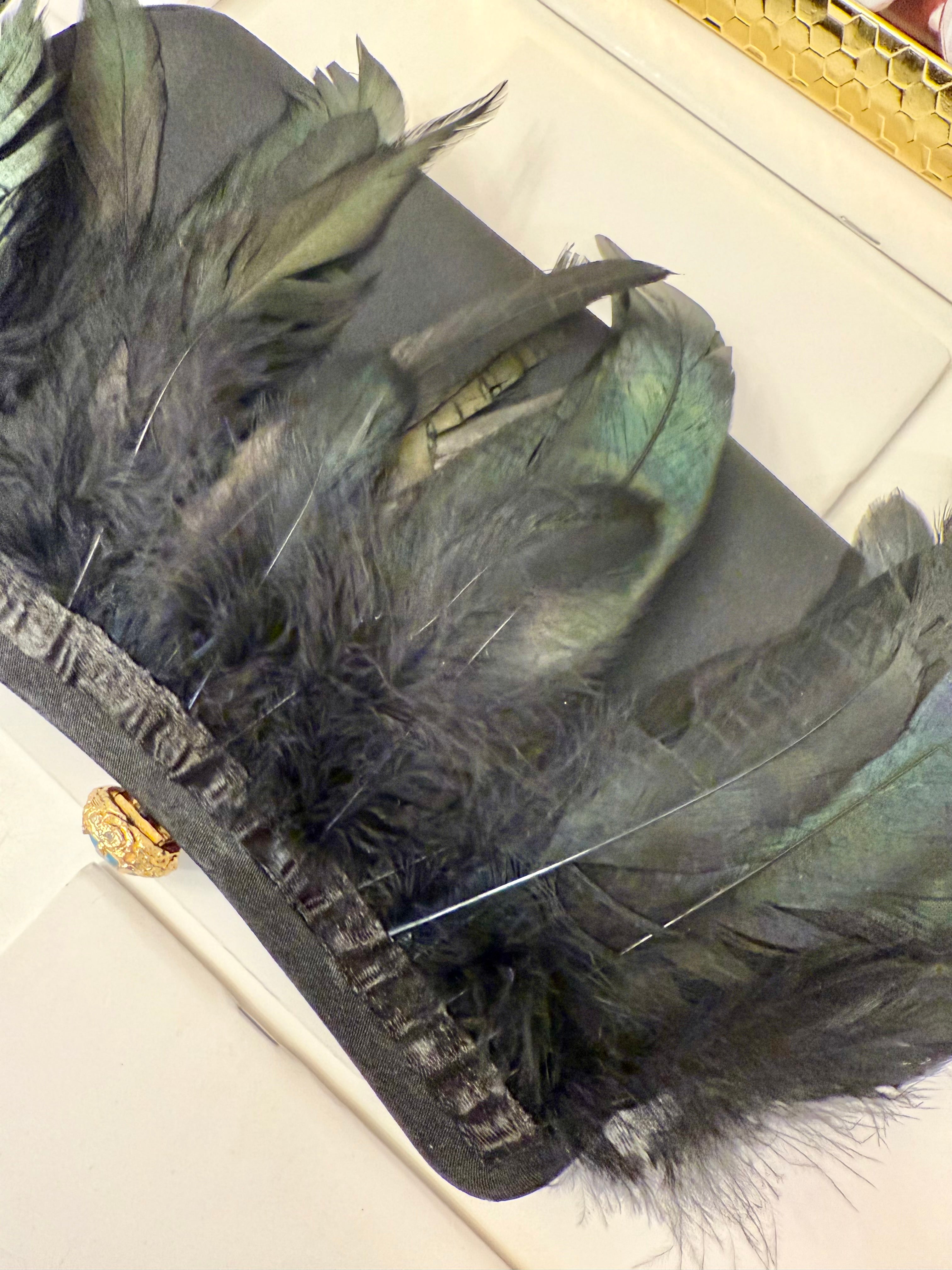 The most divine feather satin clutch... so divine