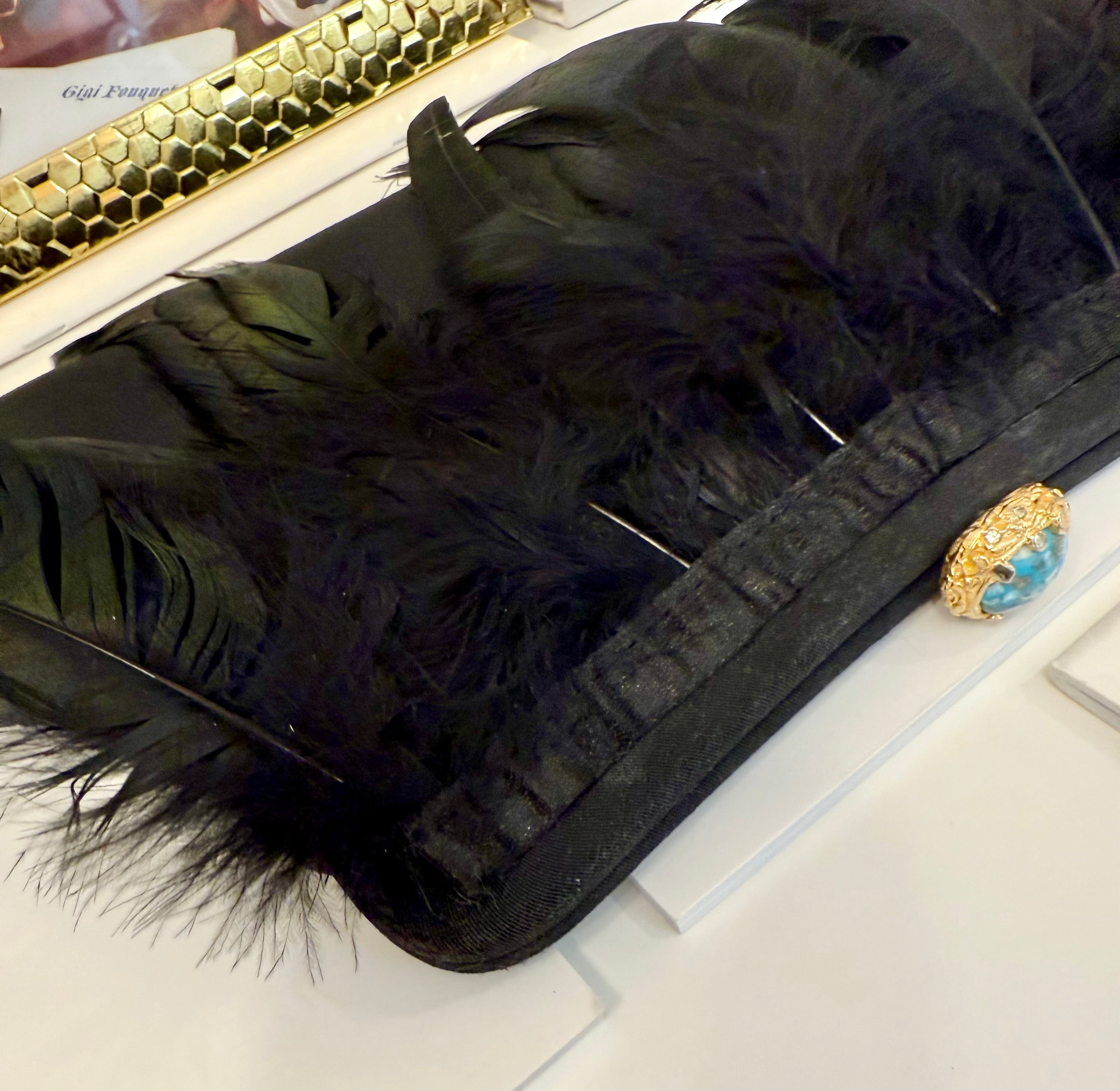 The most divine feather satin clutch... so divine