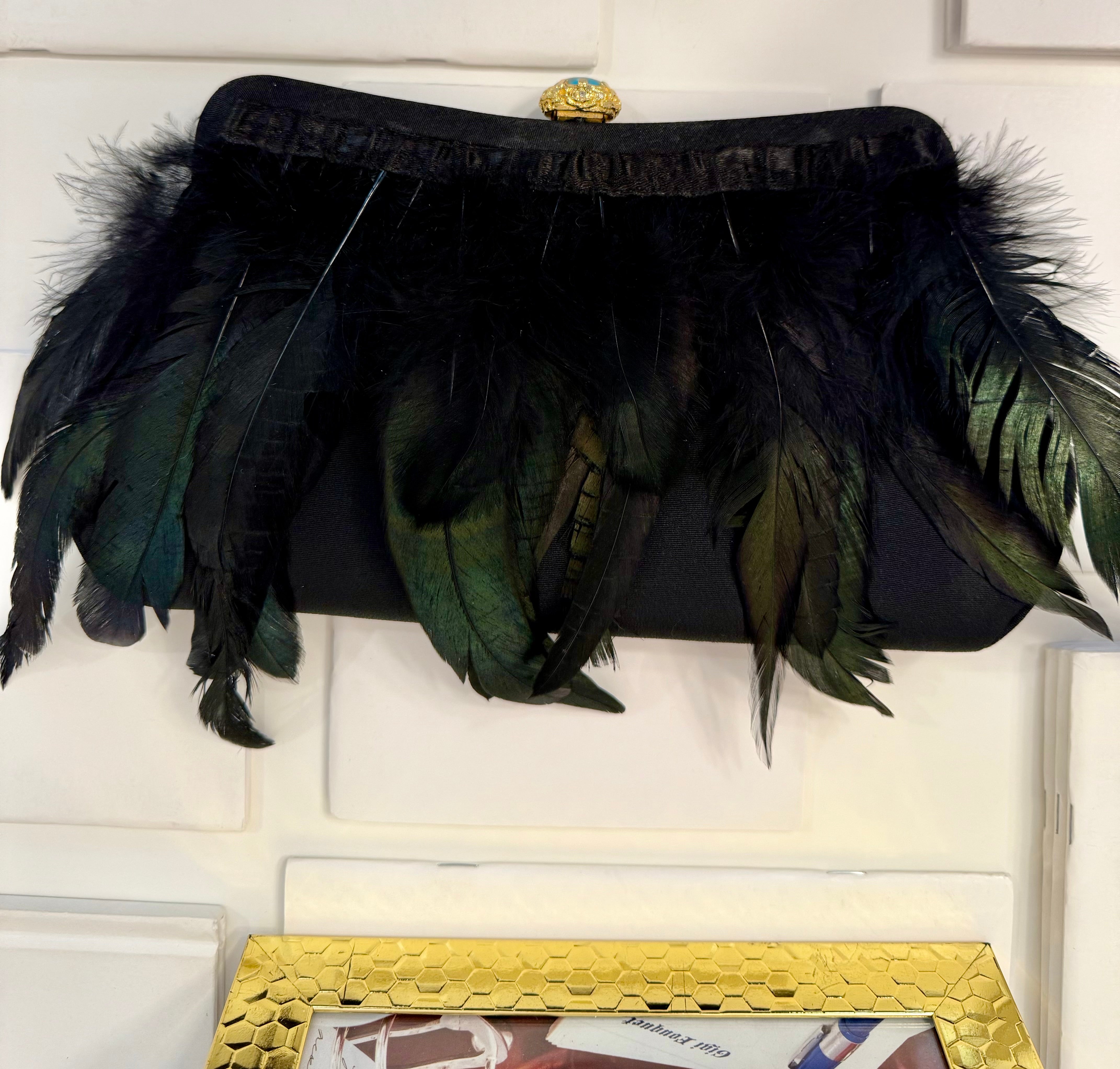 The most divine feather satin clutch... so divine