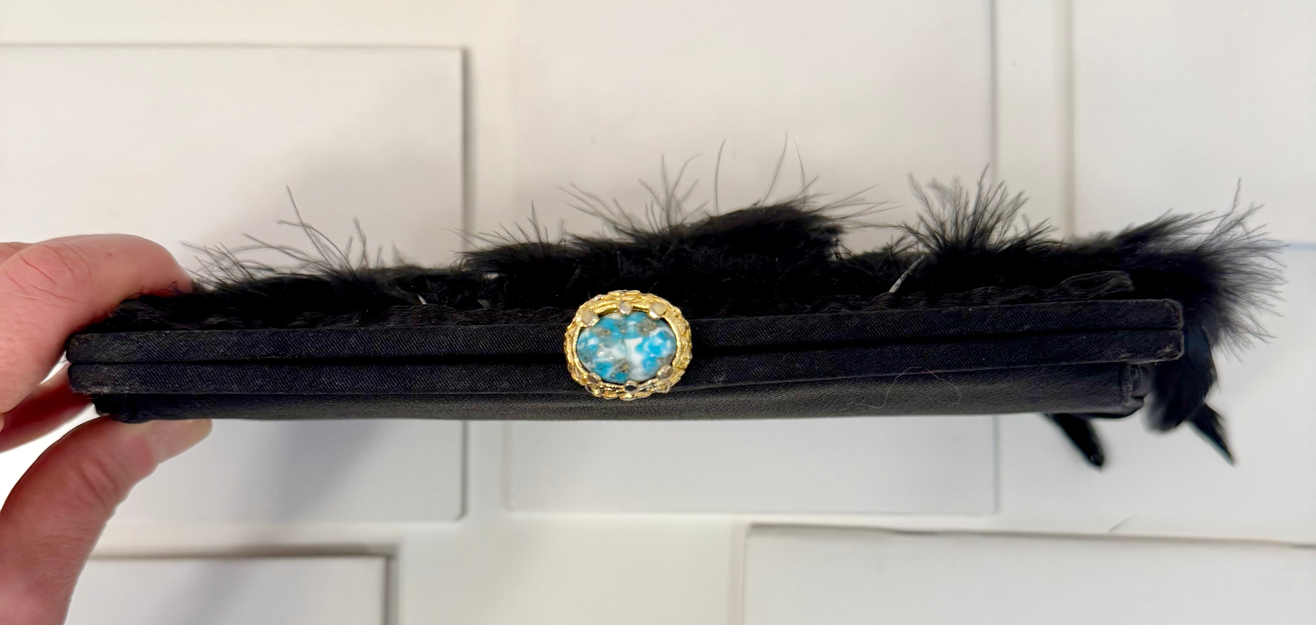 The most divine feather satin clutch... so divine