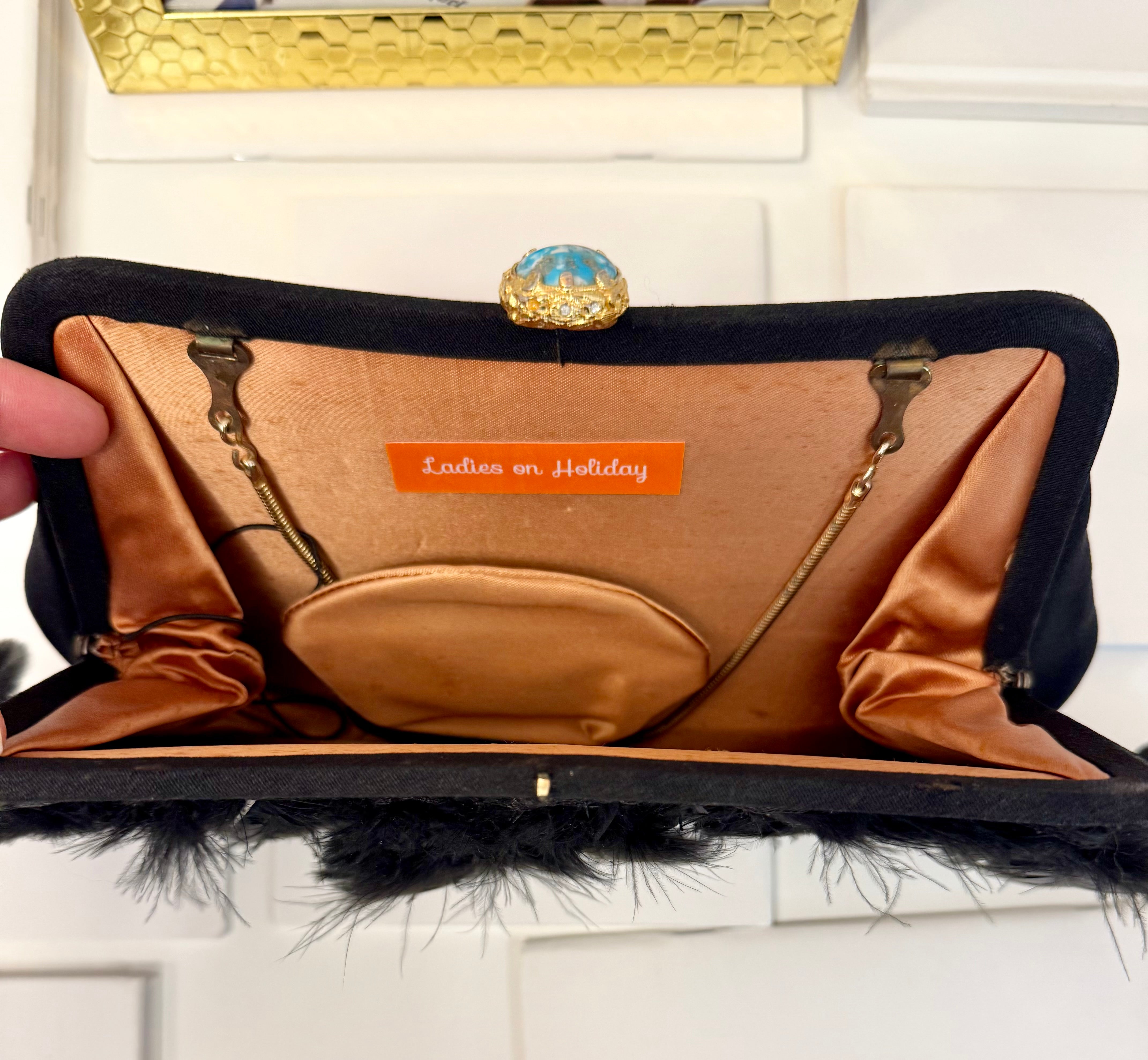 The most divine feather satin clutch... so divine