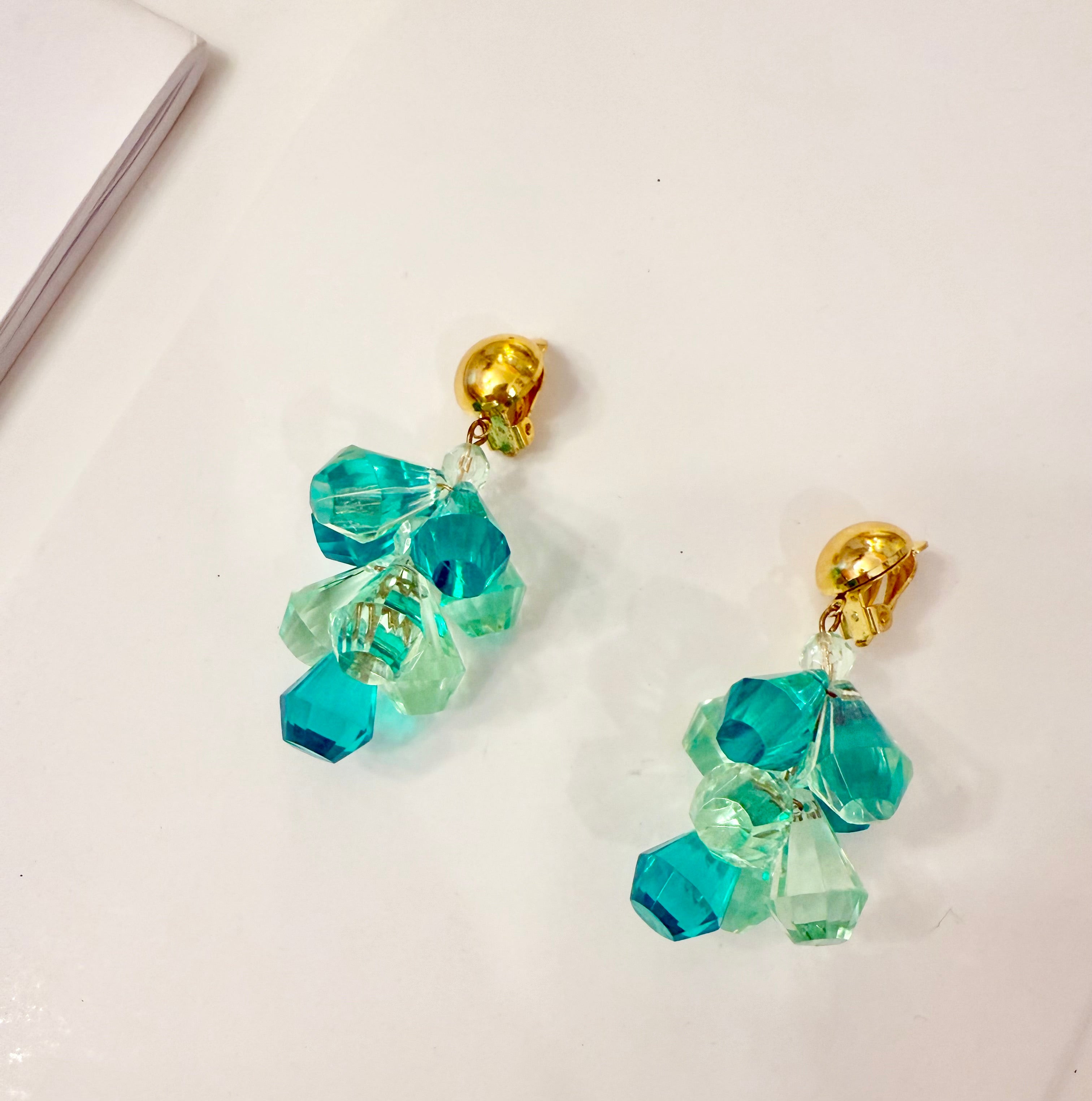 The most charming and colorful cascading monochromatic drop earrings... so elegant