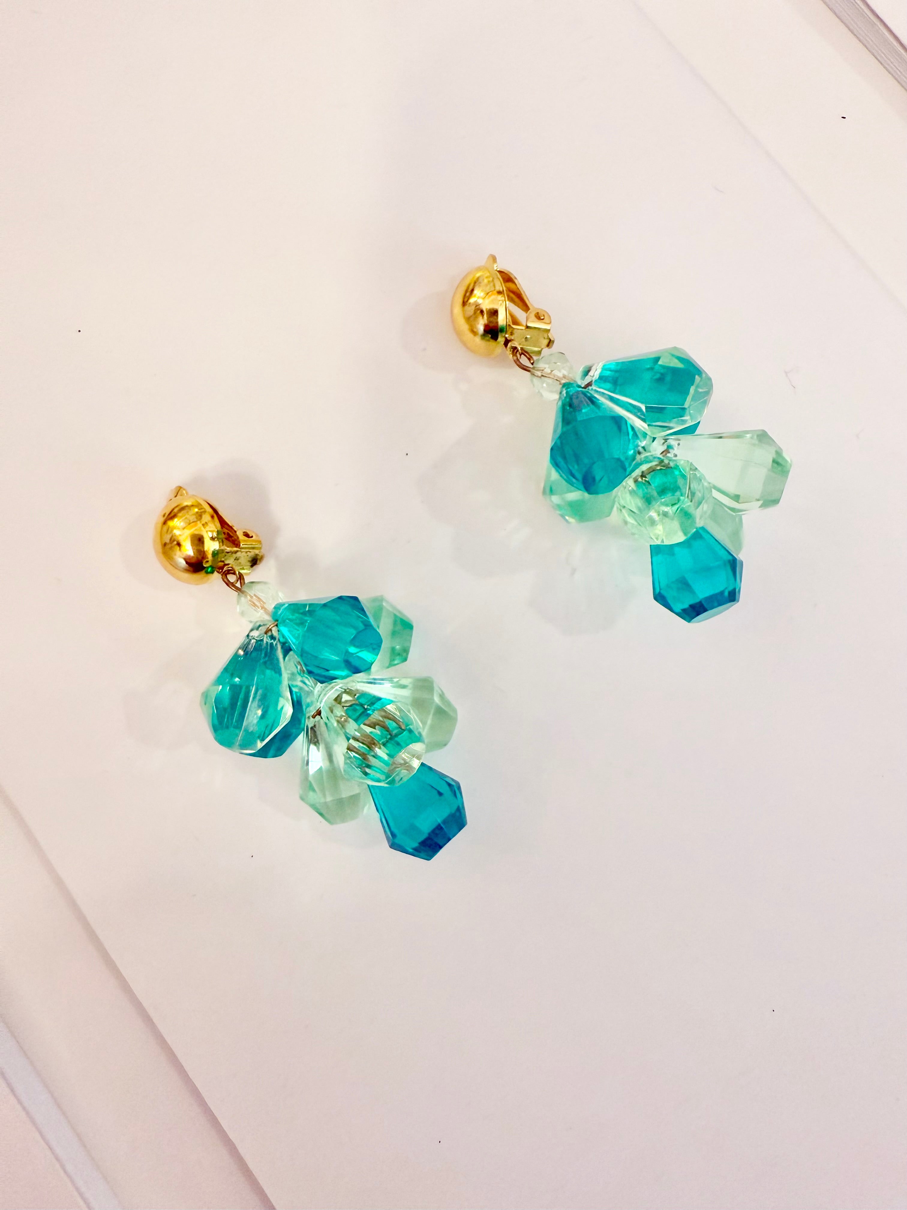 The most charming and colorful cascading monochromatic drop earrings... so elegant
