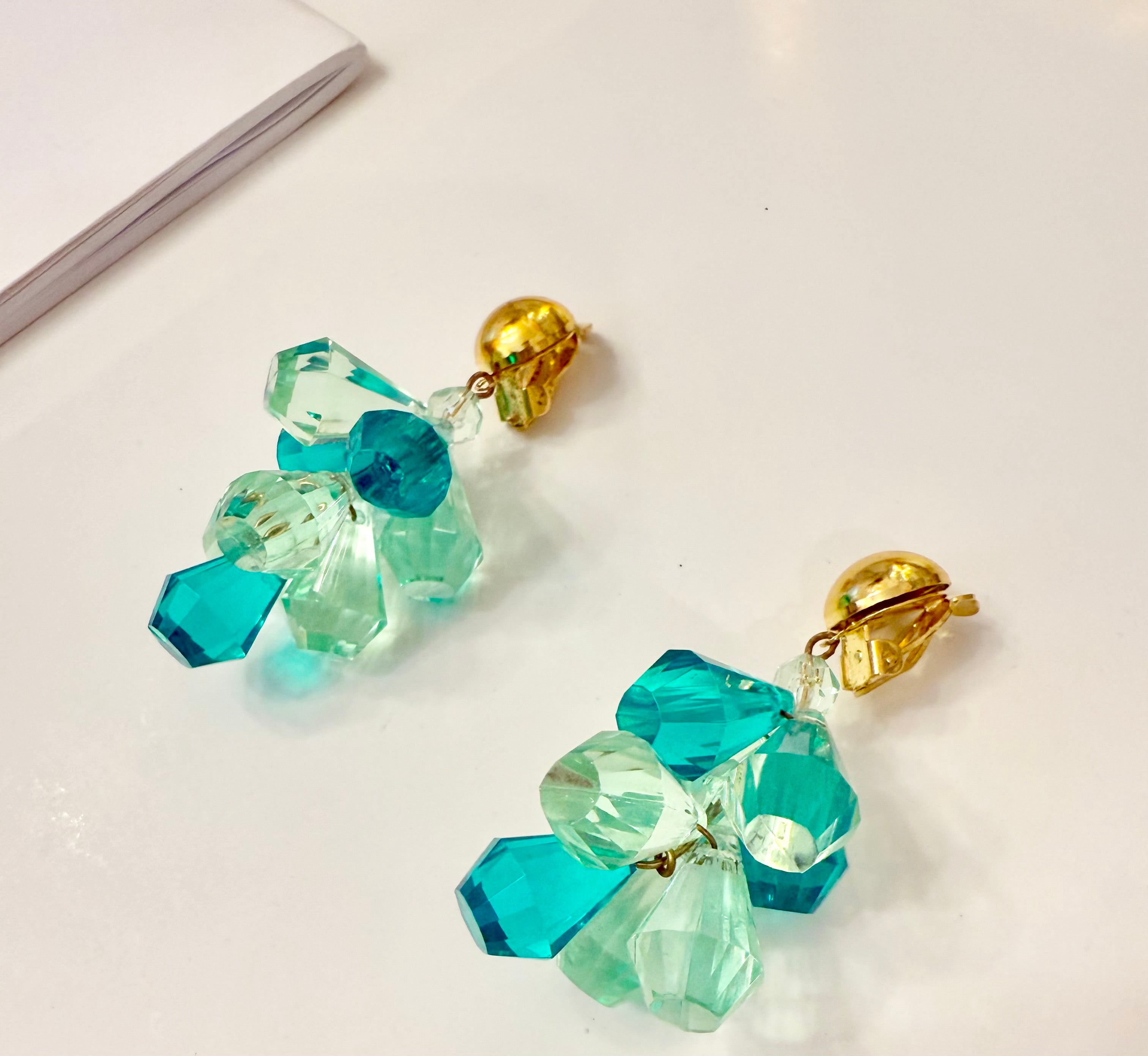 The most charming and colorful cascading monochromatic drop earrings... so elegant