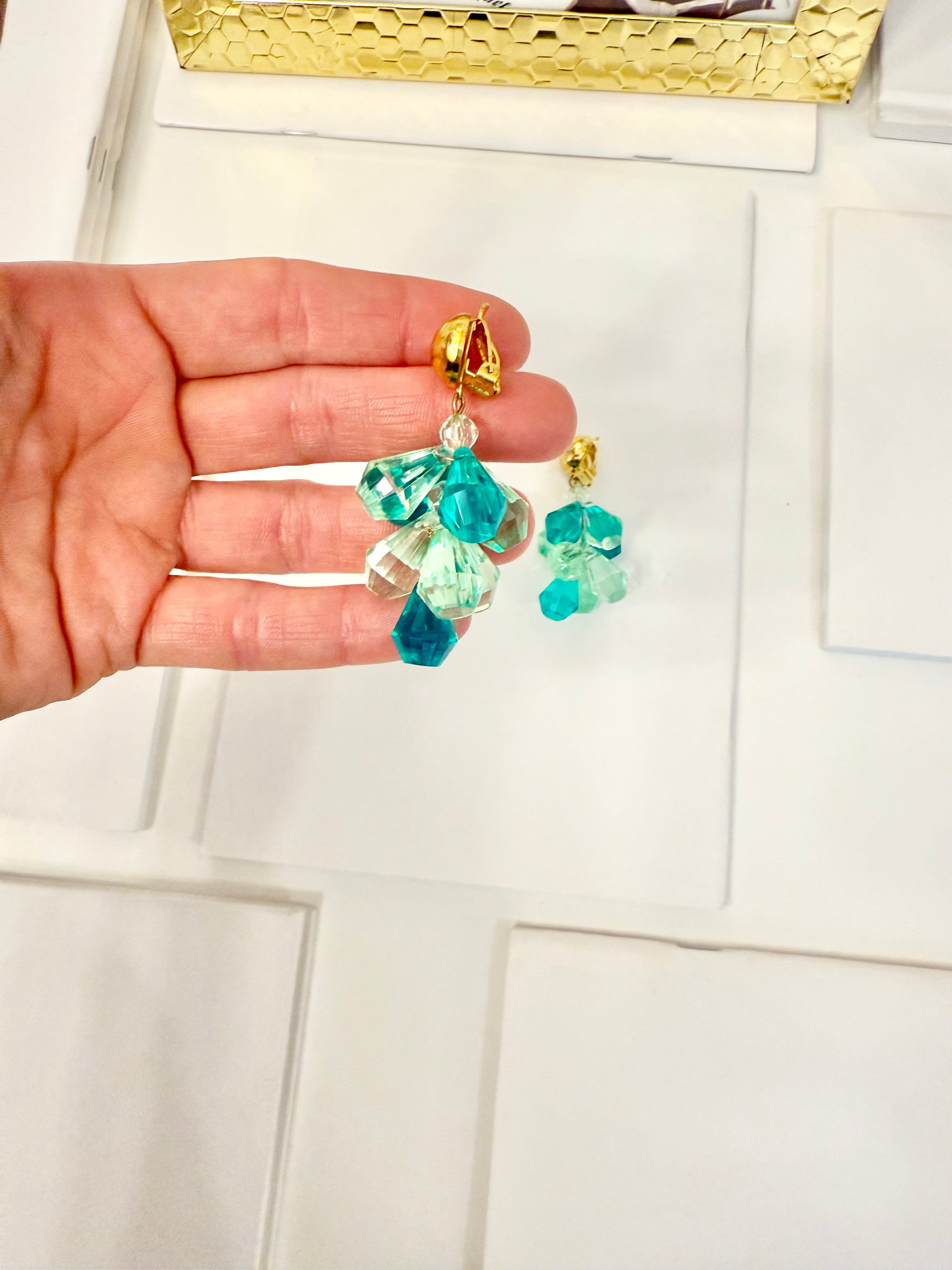 The most charming and colorful cascading monochromatic drop earrings... so elegant
