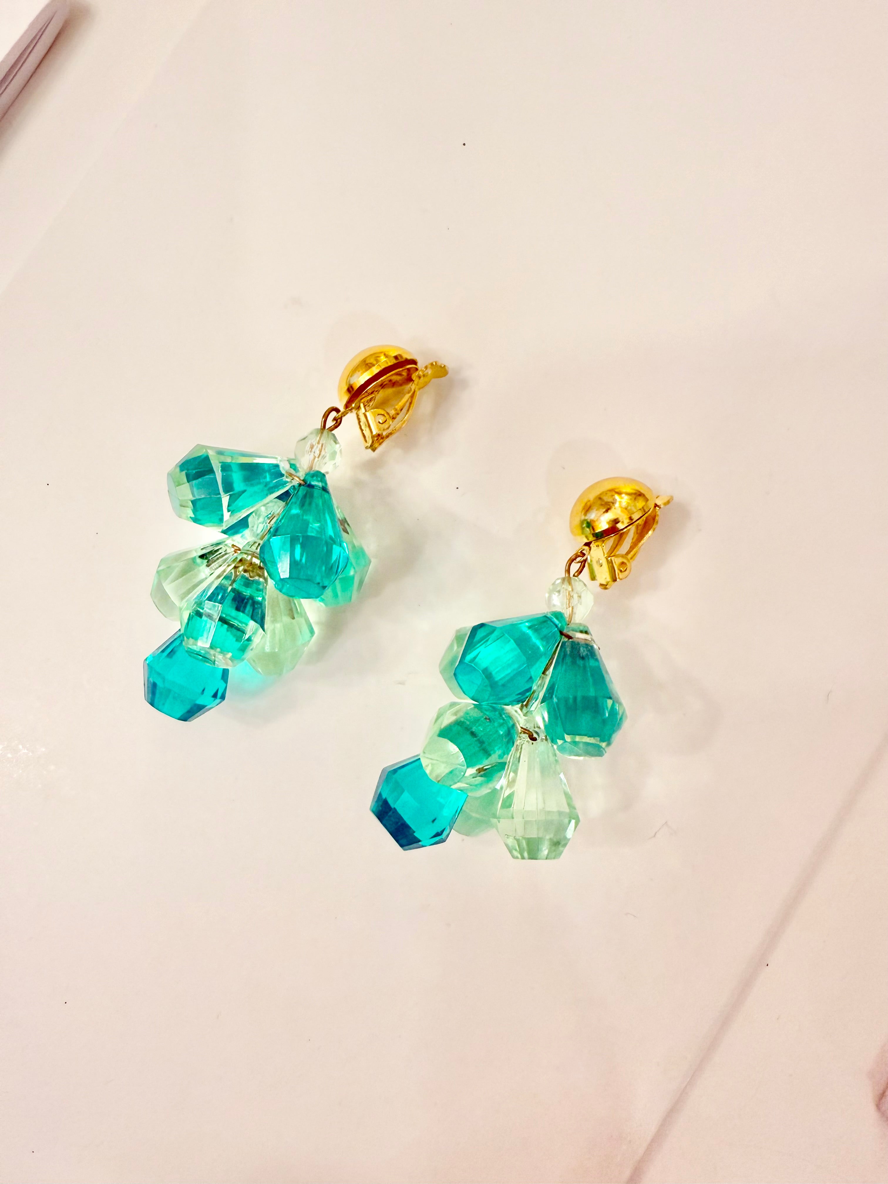 The most charming and colorful cascading monochromatic drop earrings... so elegant
