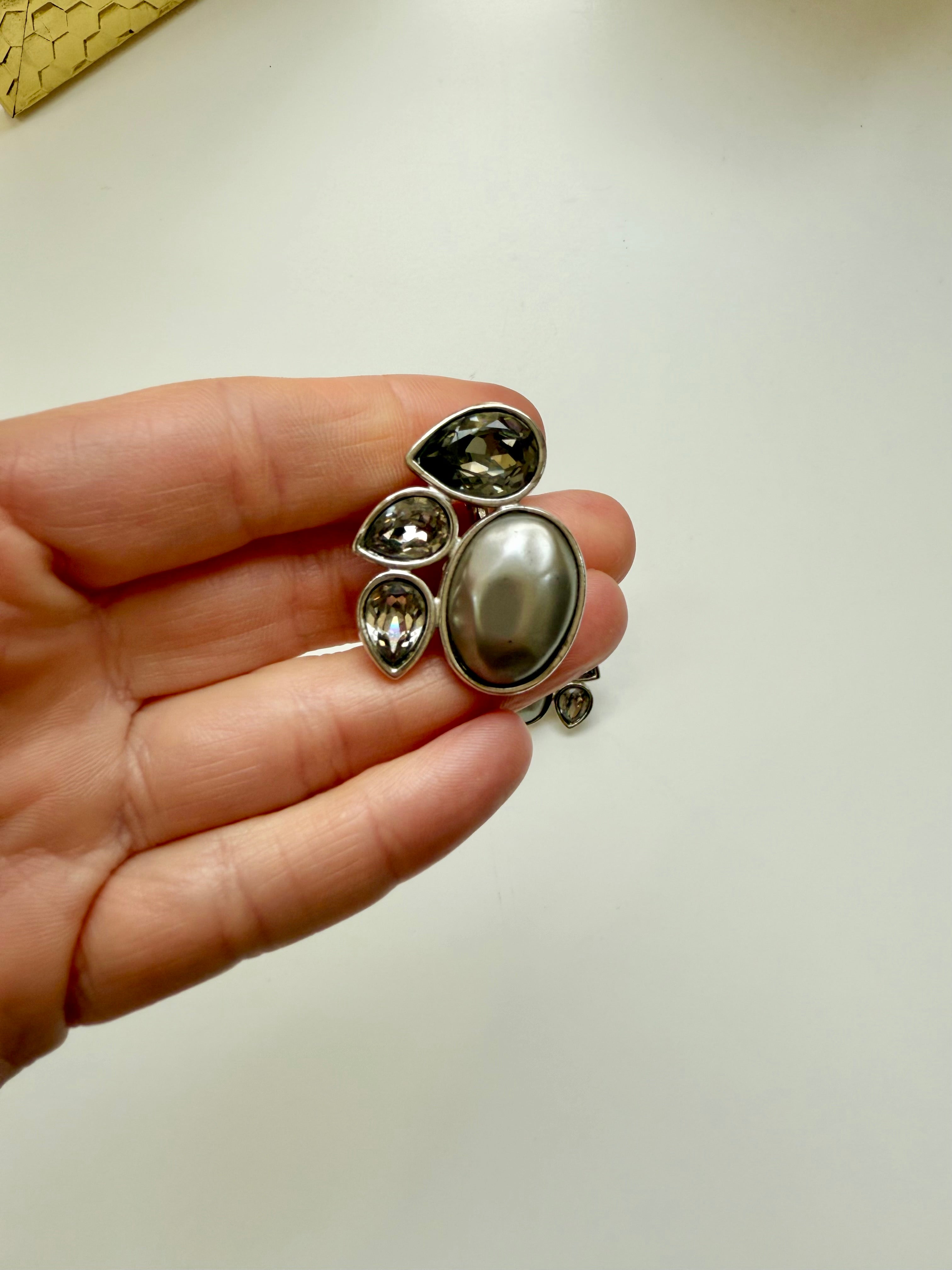 The most darling gray pearl YSL.....so chic, and timeless.