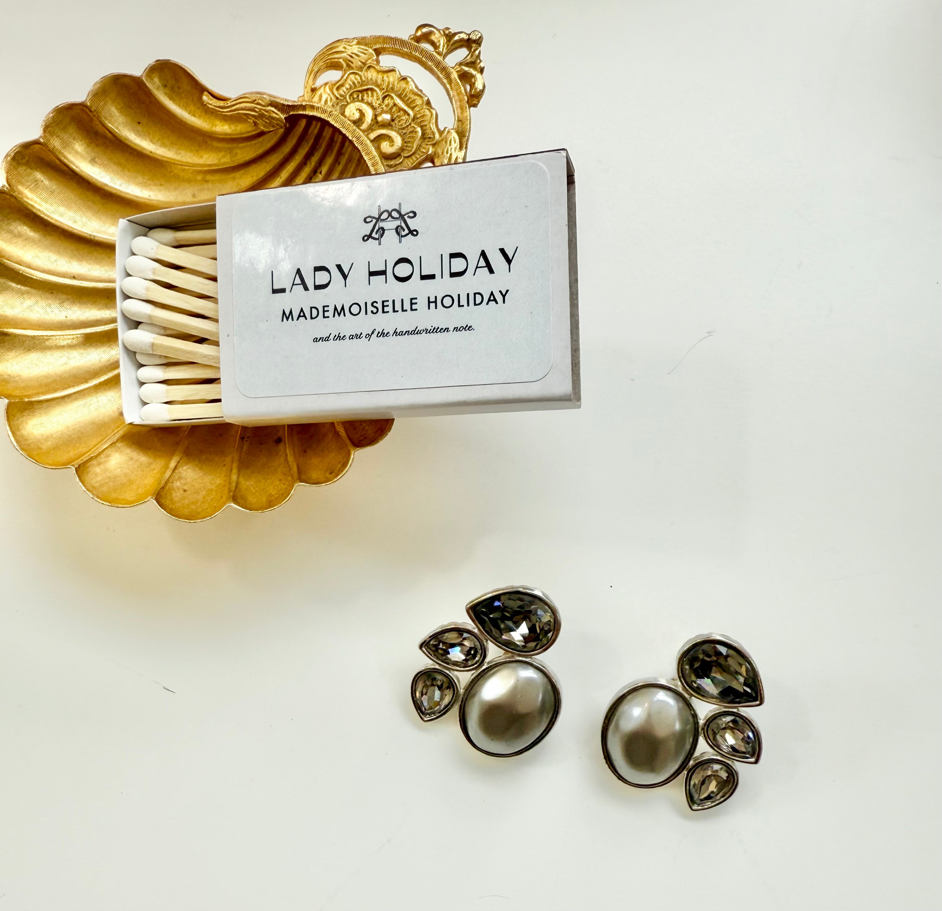 The most darling gray pearl YSL.....so chic, and timeless.
