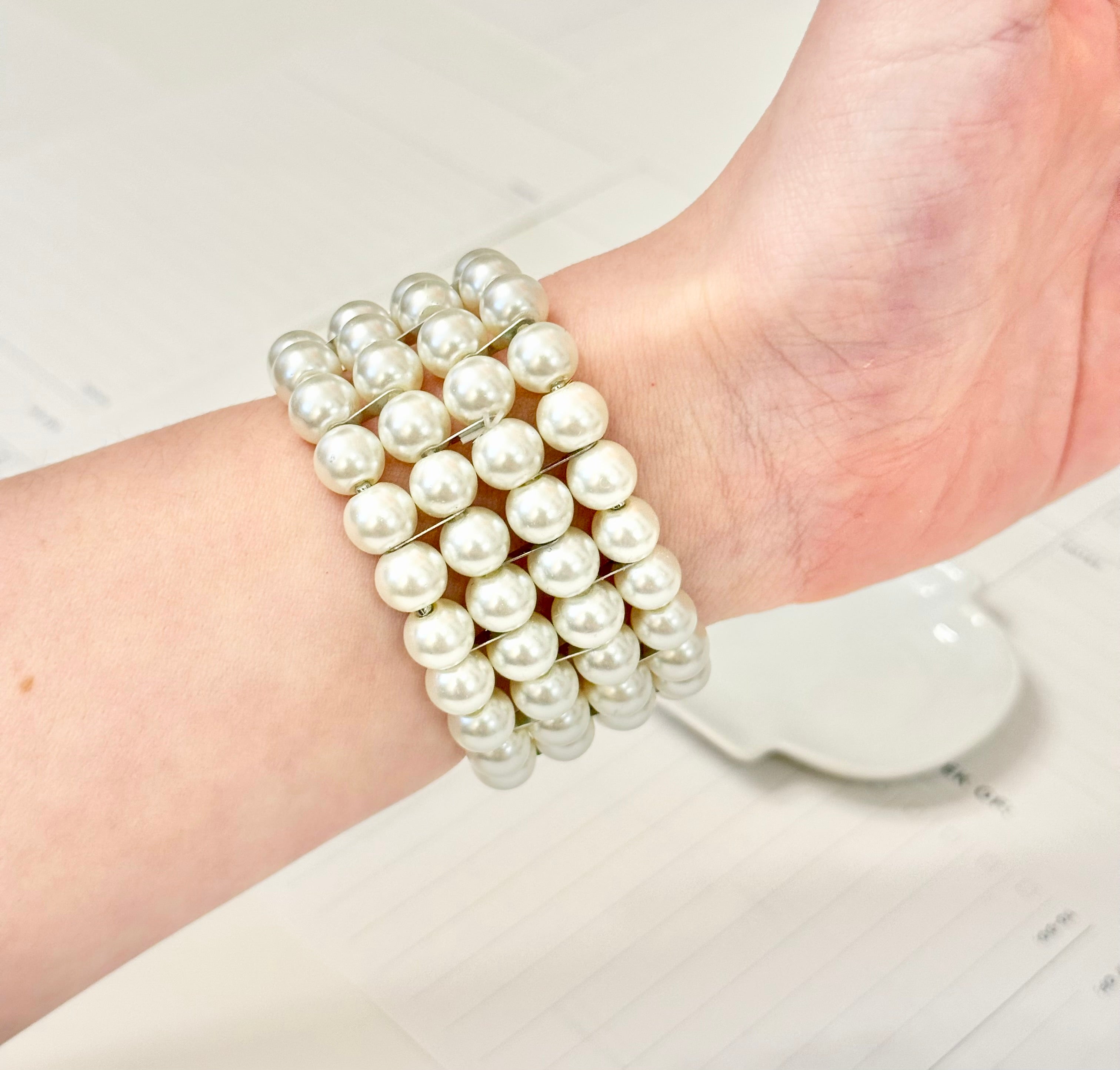 The most charming multi strand pearl bracelet....